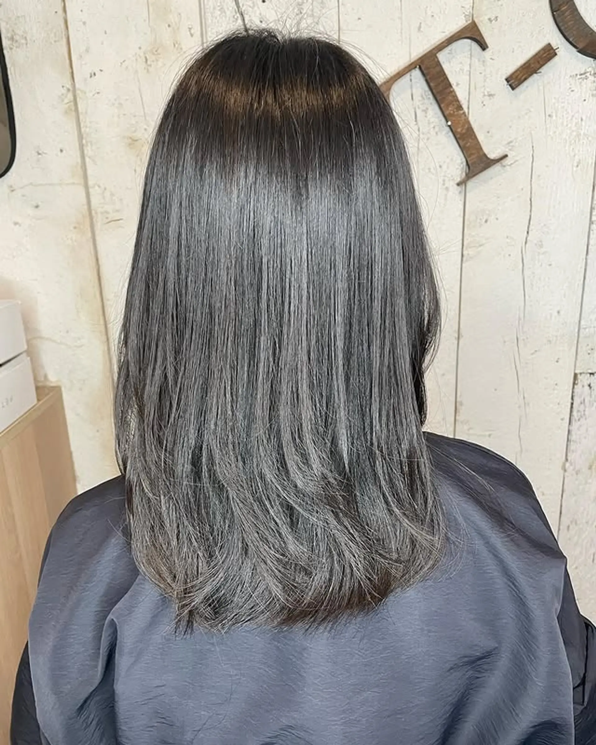A layered lob with a striking silver ombre effect. 1