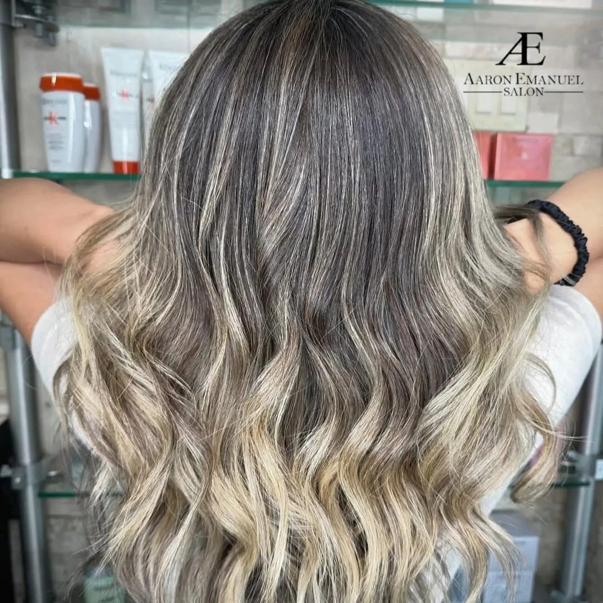 A bronde balayage with effortless waves and stunning color dimension. 1