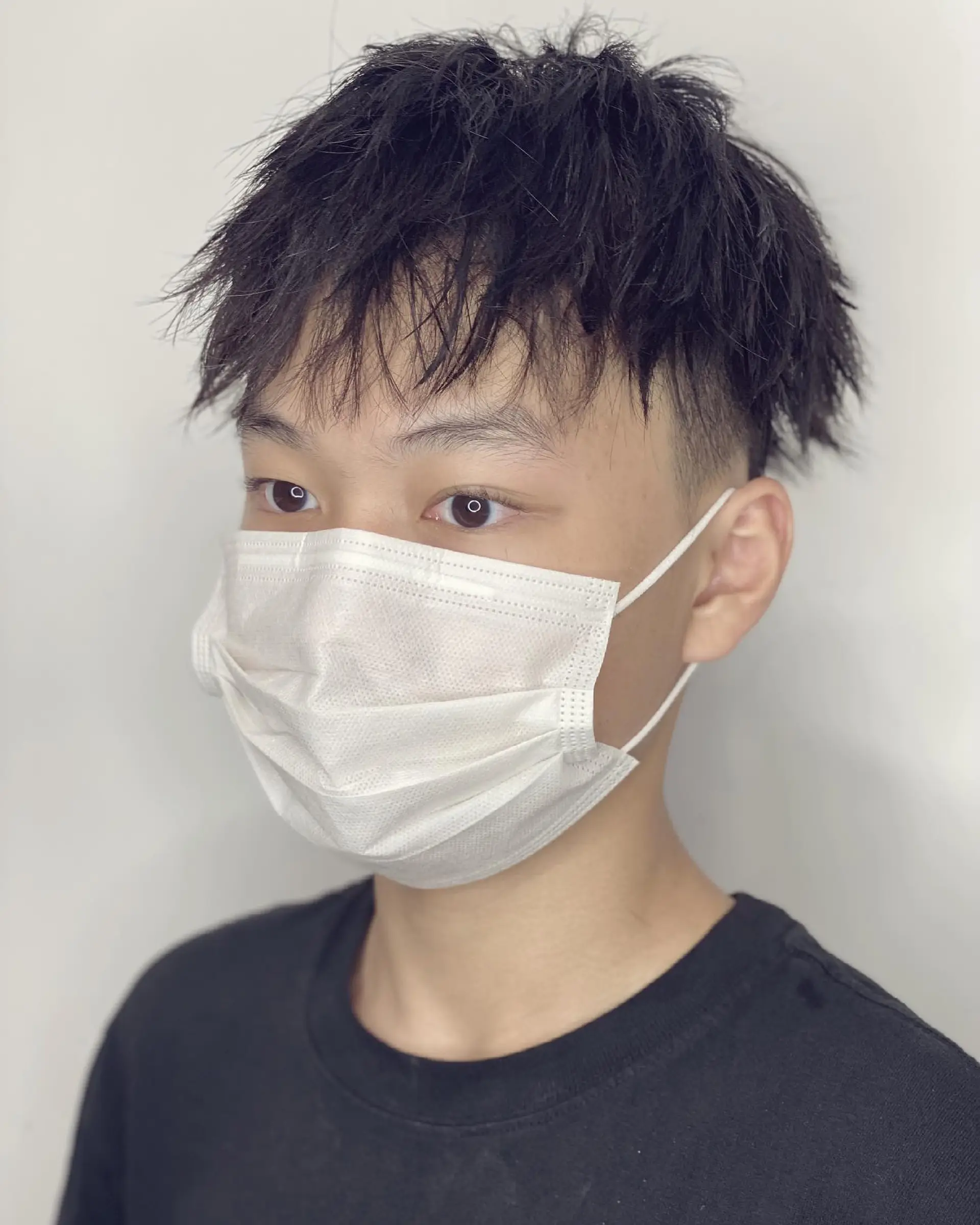 A textured crop with faded sides. 1