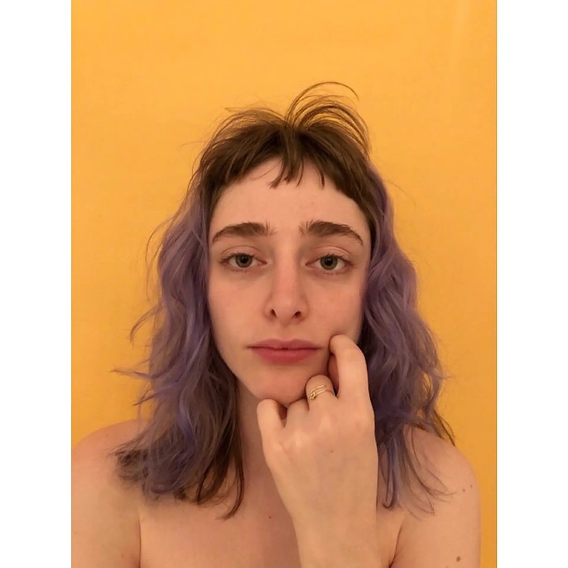 Medium length shaggy waves with short baby bangs. 1