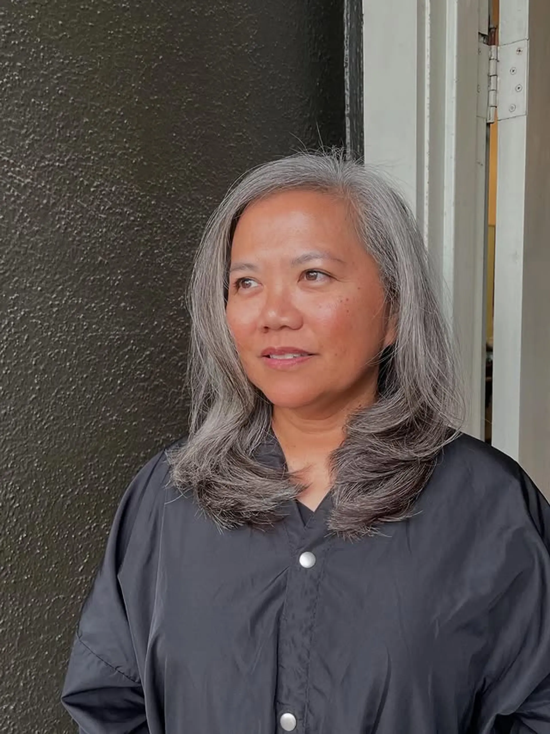 A layered lob with soft waves and face-framing layers. 1