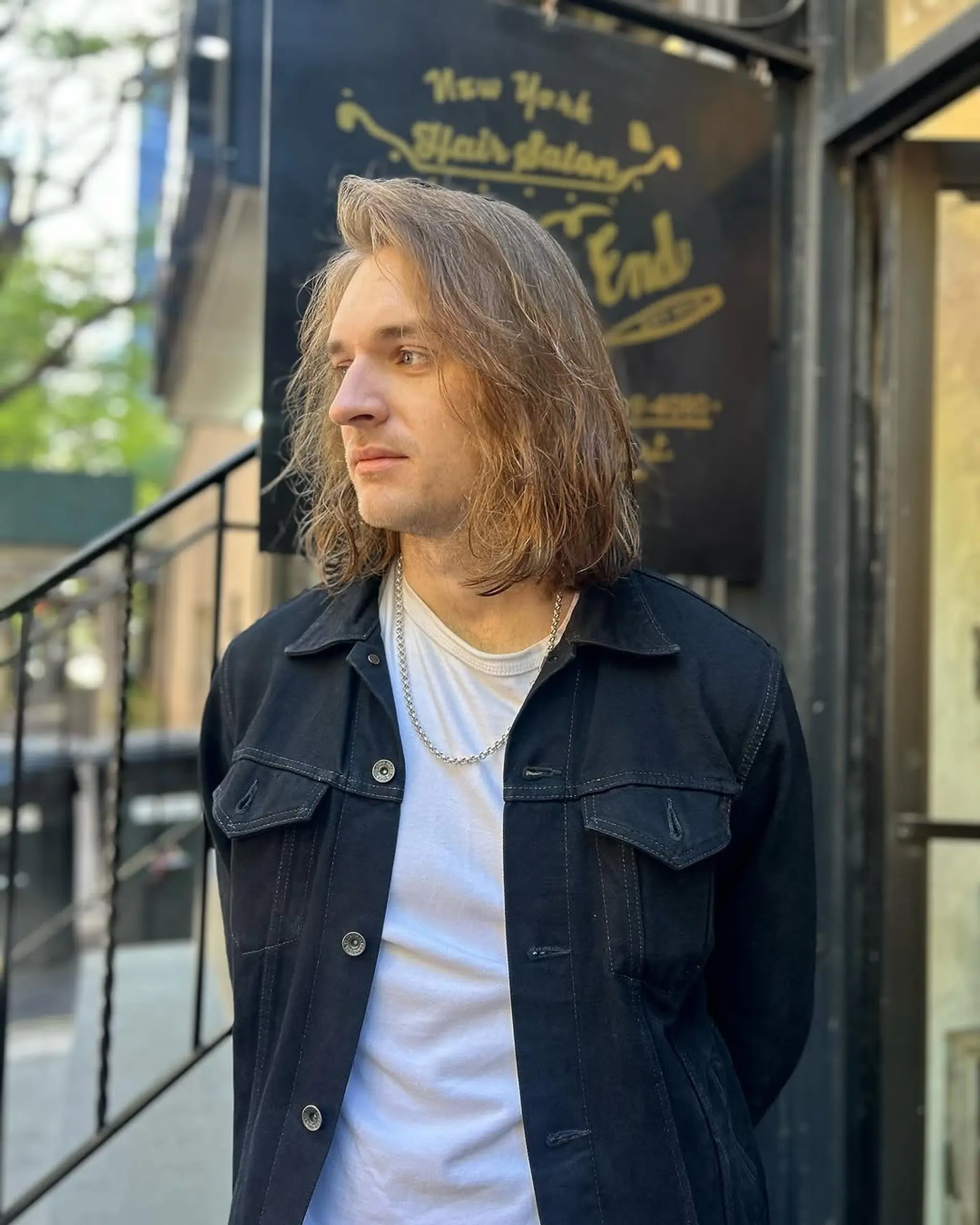 Long layered hairstyle with a natural, flowing style. 1