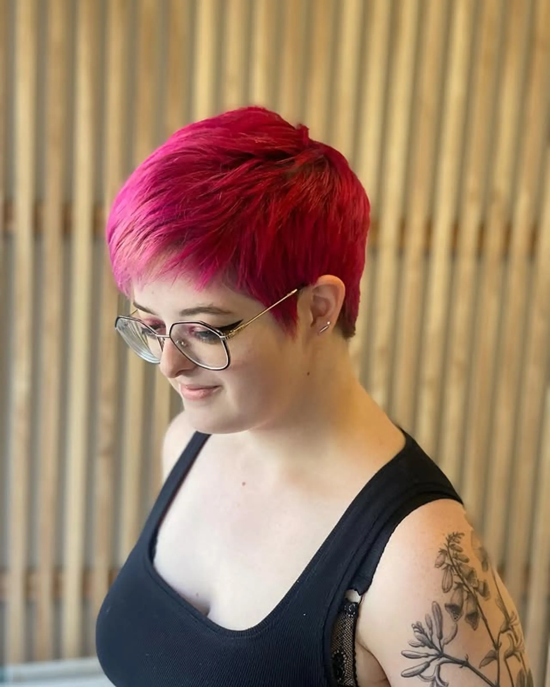 A short, textured pixie cut with choppy layers. 1