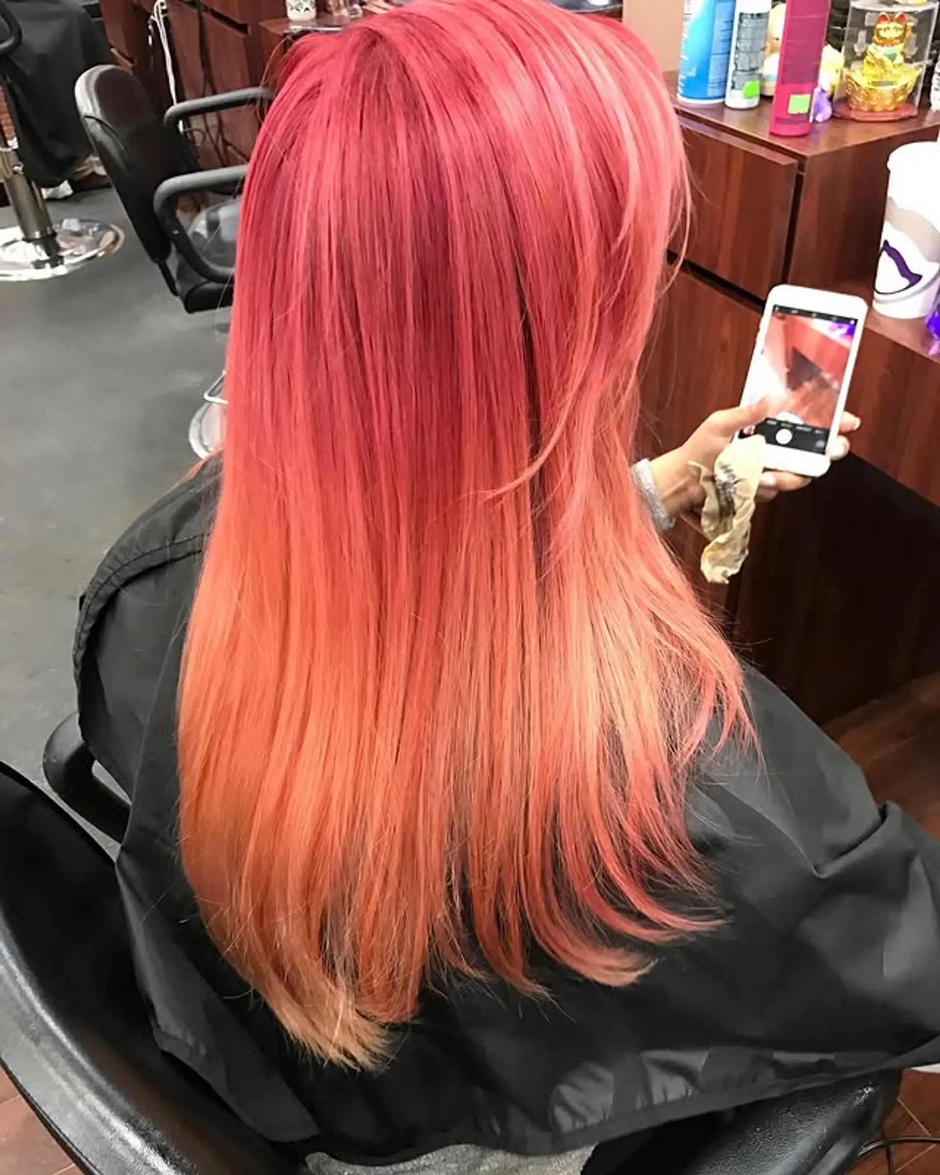 Long straight hair with a vibrant sunset ombre color melt. 1