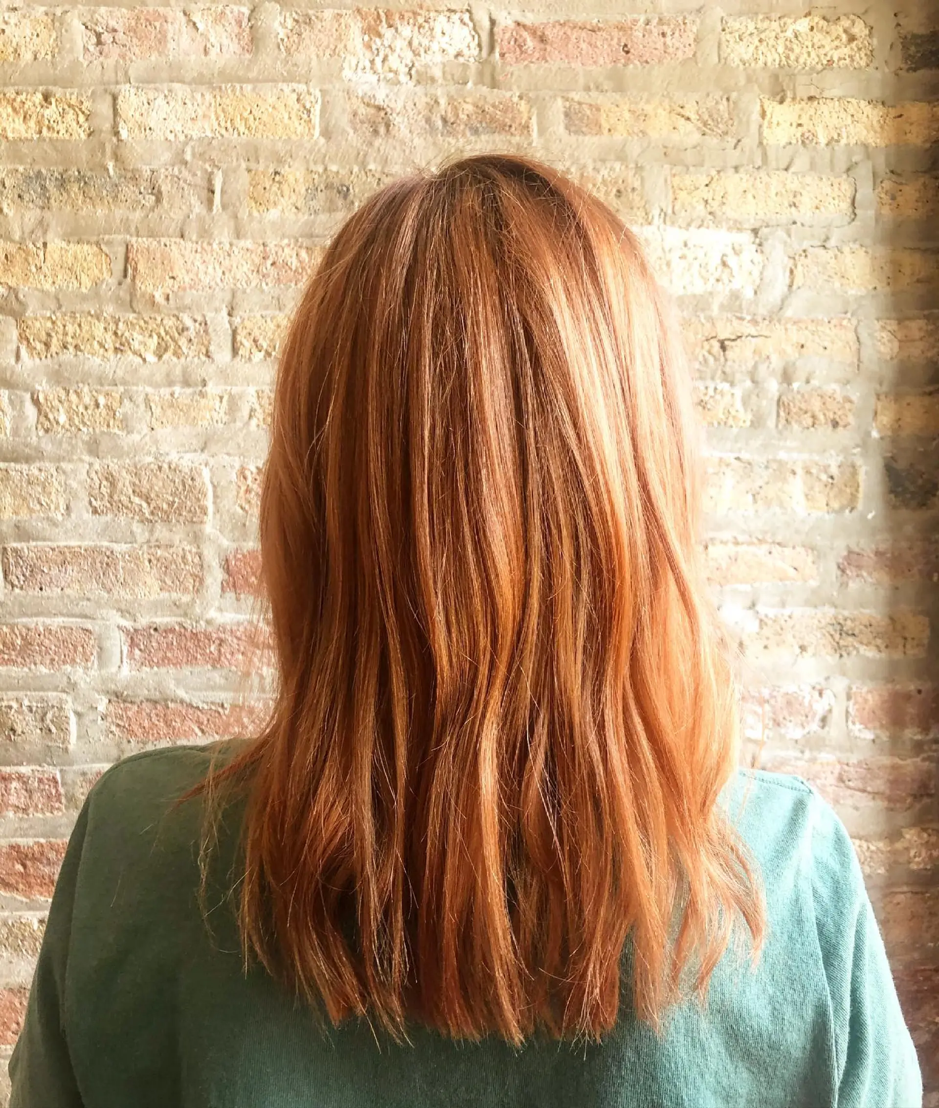 A medium-length shag haircut with lots of layers. 1