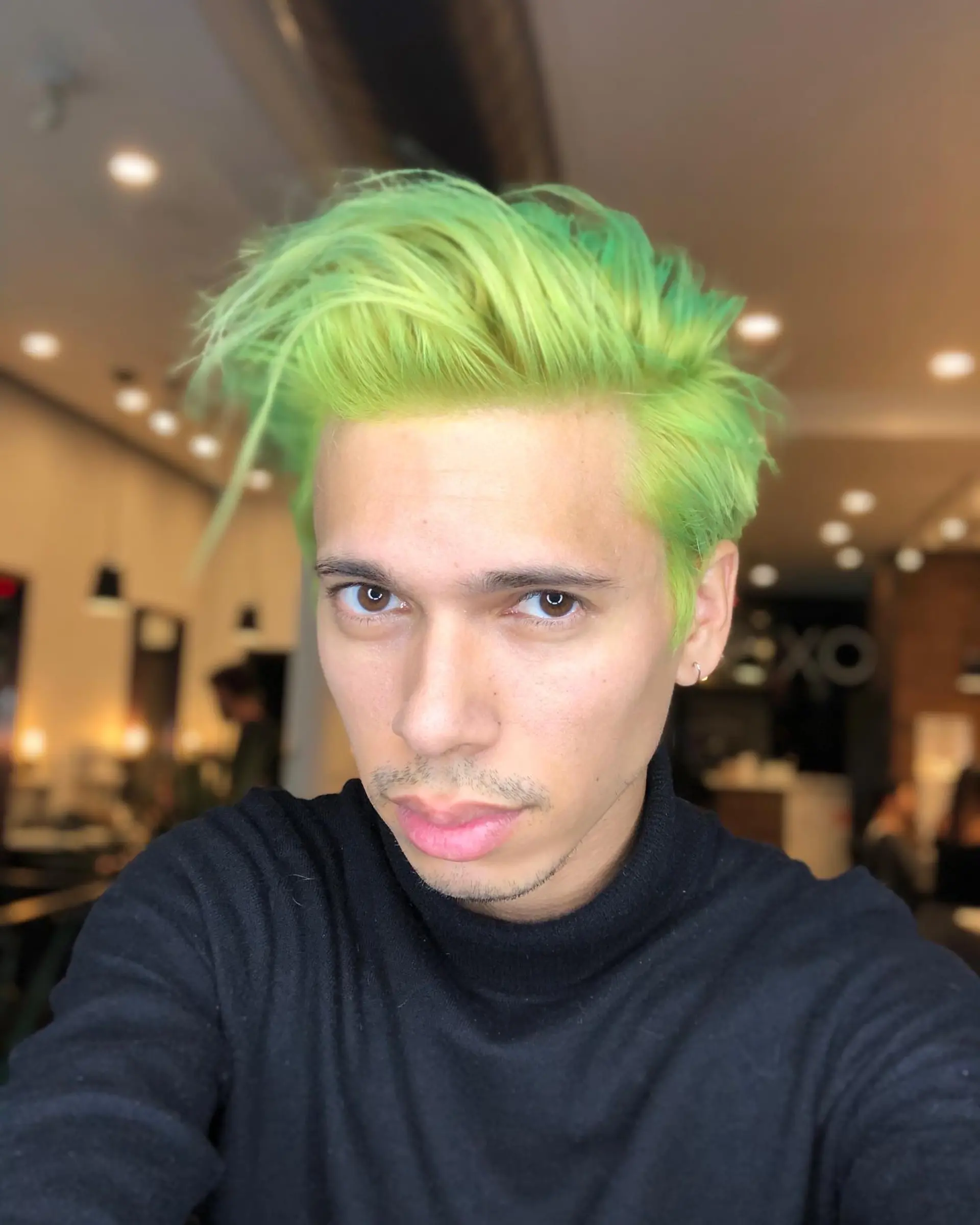 A vibrant neon lime green buzz cut. 1