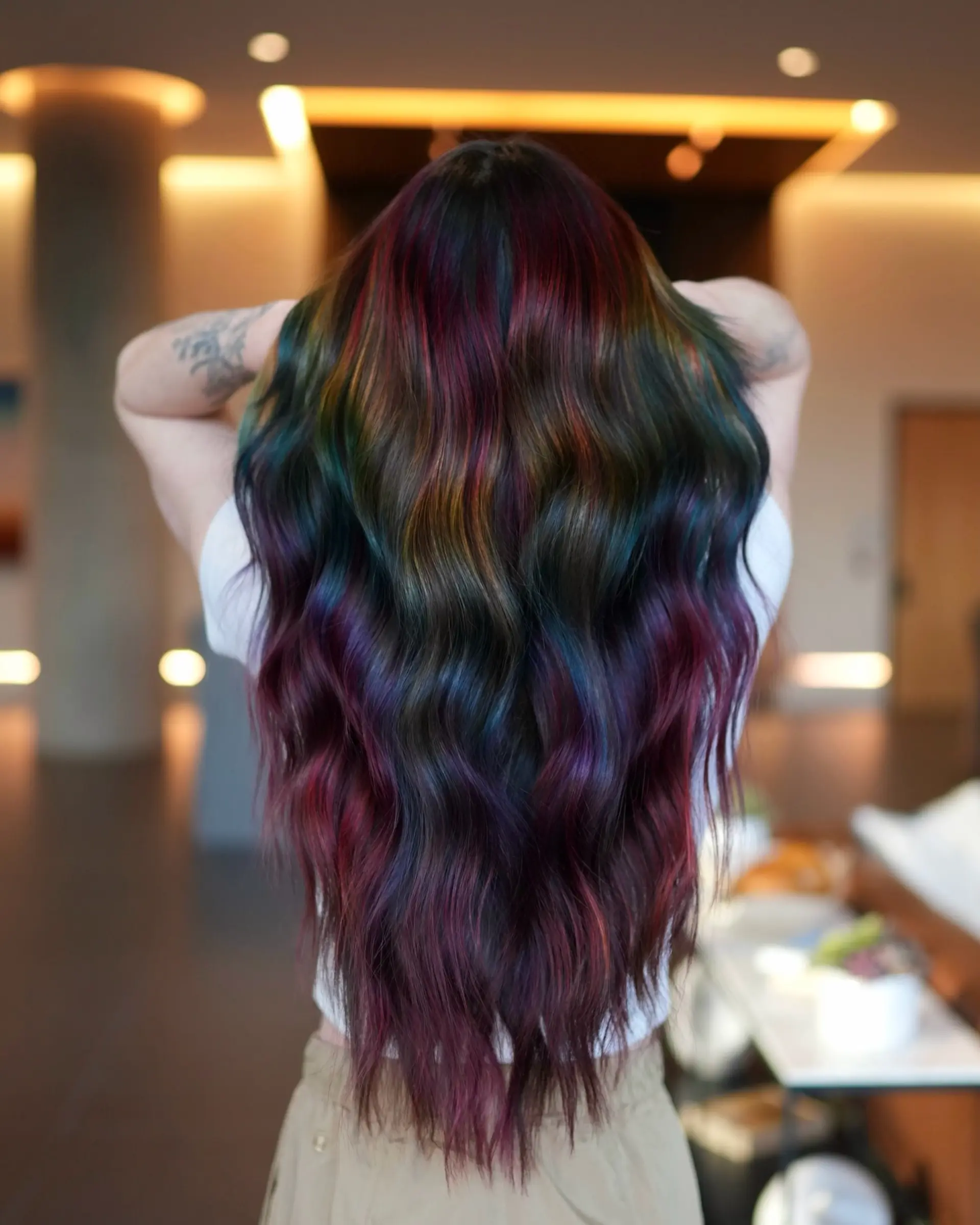 Long flowing waves with a dark base featuring deeply saturated, blended jewel-toned rainbow hues. 1