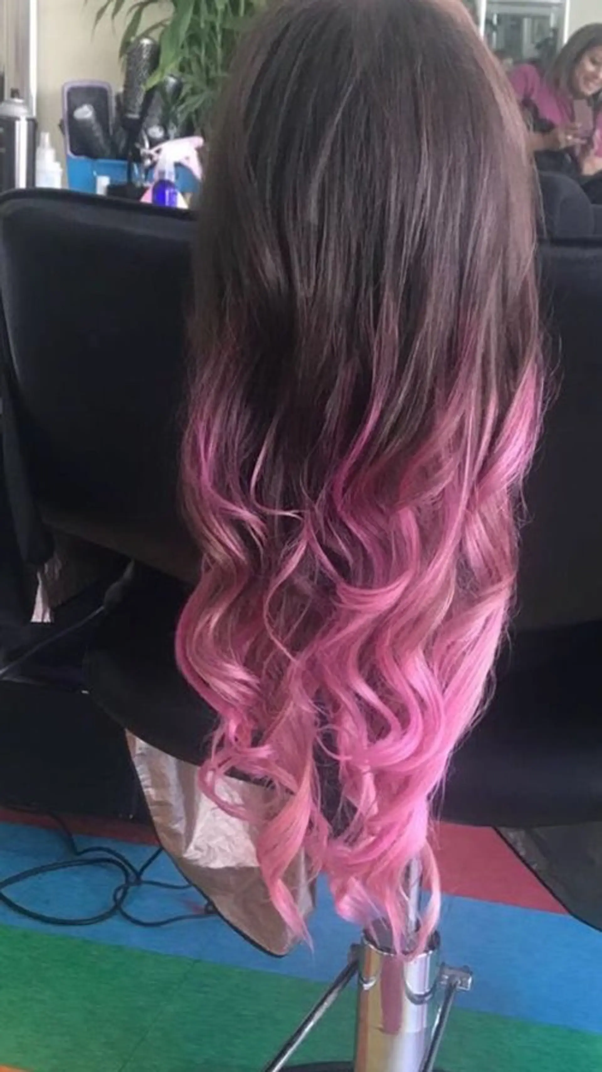 A wavy long hair with a brown to pink ombre effect. 1