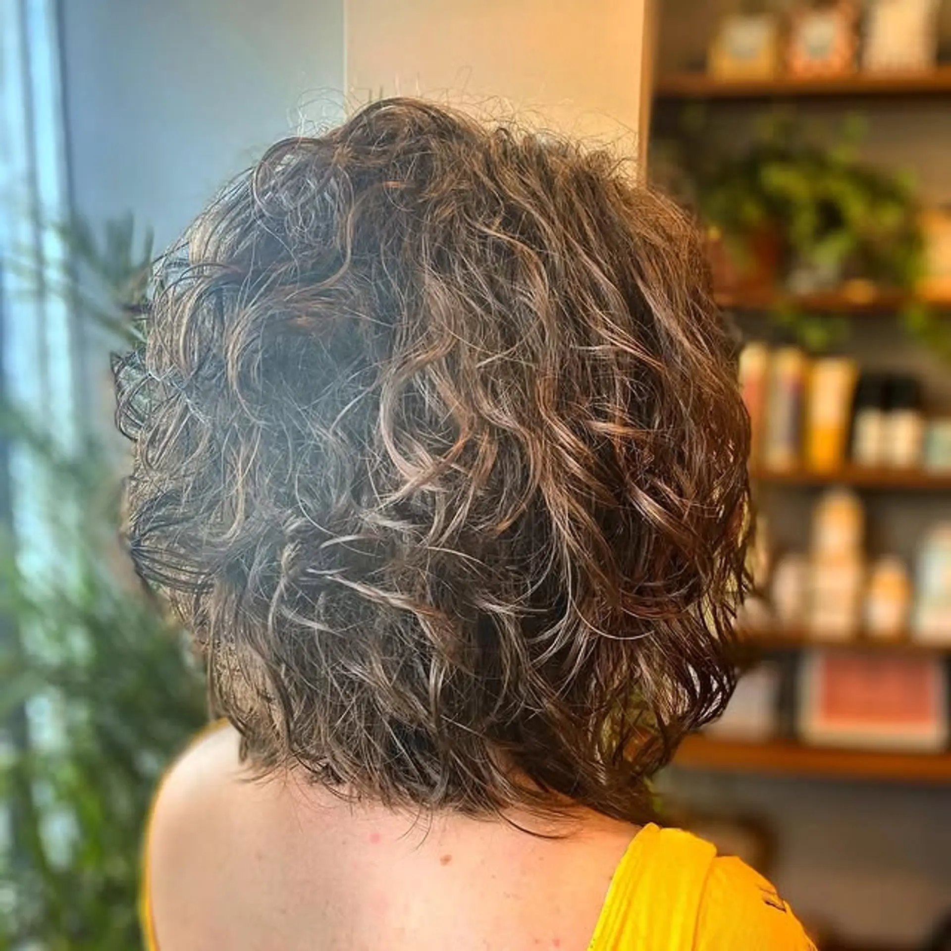 A trendy curly shag with lots of texture and dimension. 1