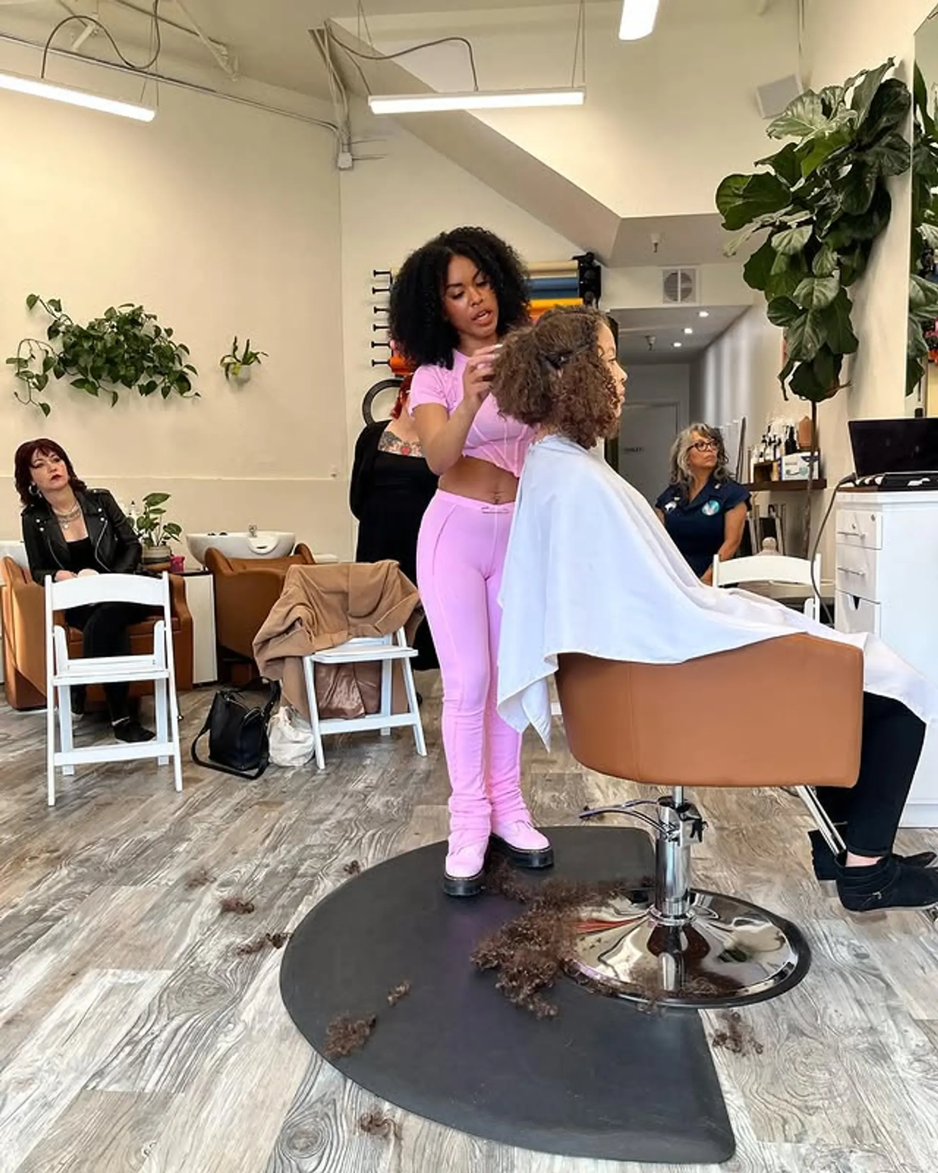 A medium-length curly bob emphasizing natural texture. 1