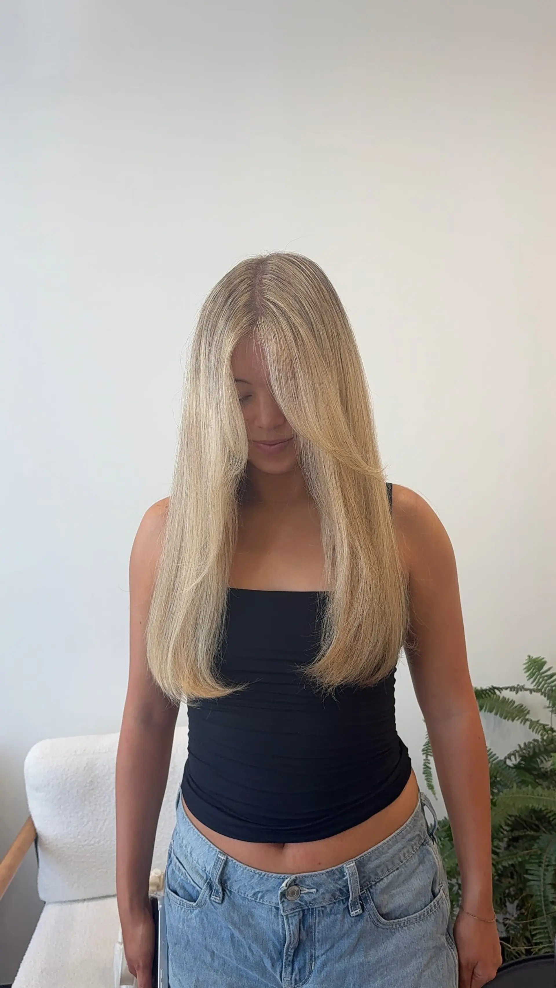 Straight, long bright blonde hair with soft face-framing curtain layers and smooth, gently rounded ends. 1