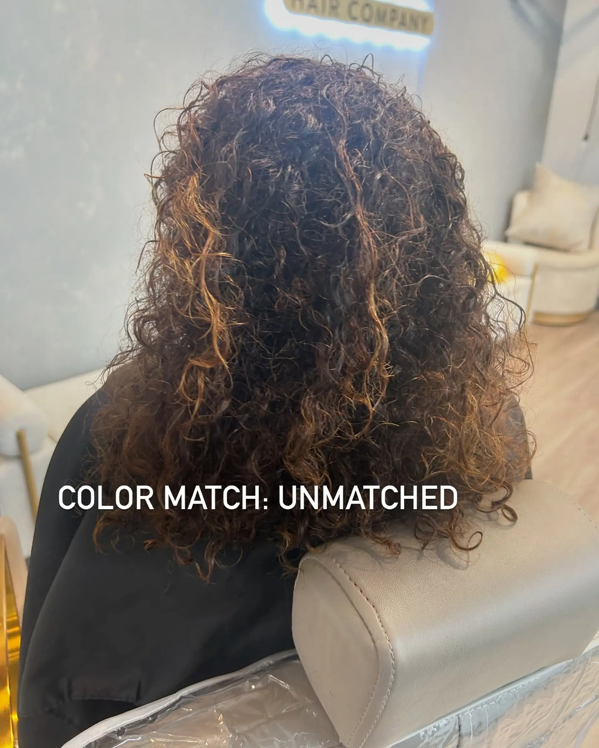 A long, wavy balayage hairstyle with bronze and auburn highlights. 2