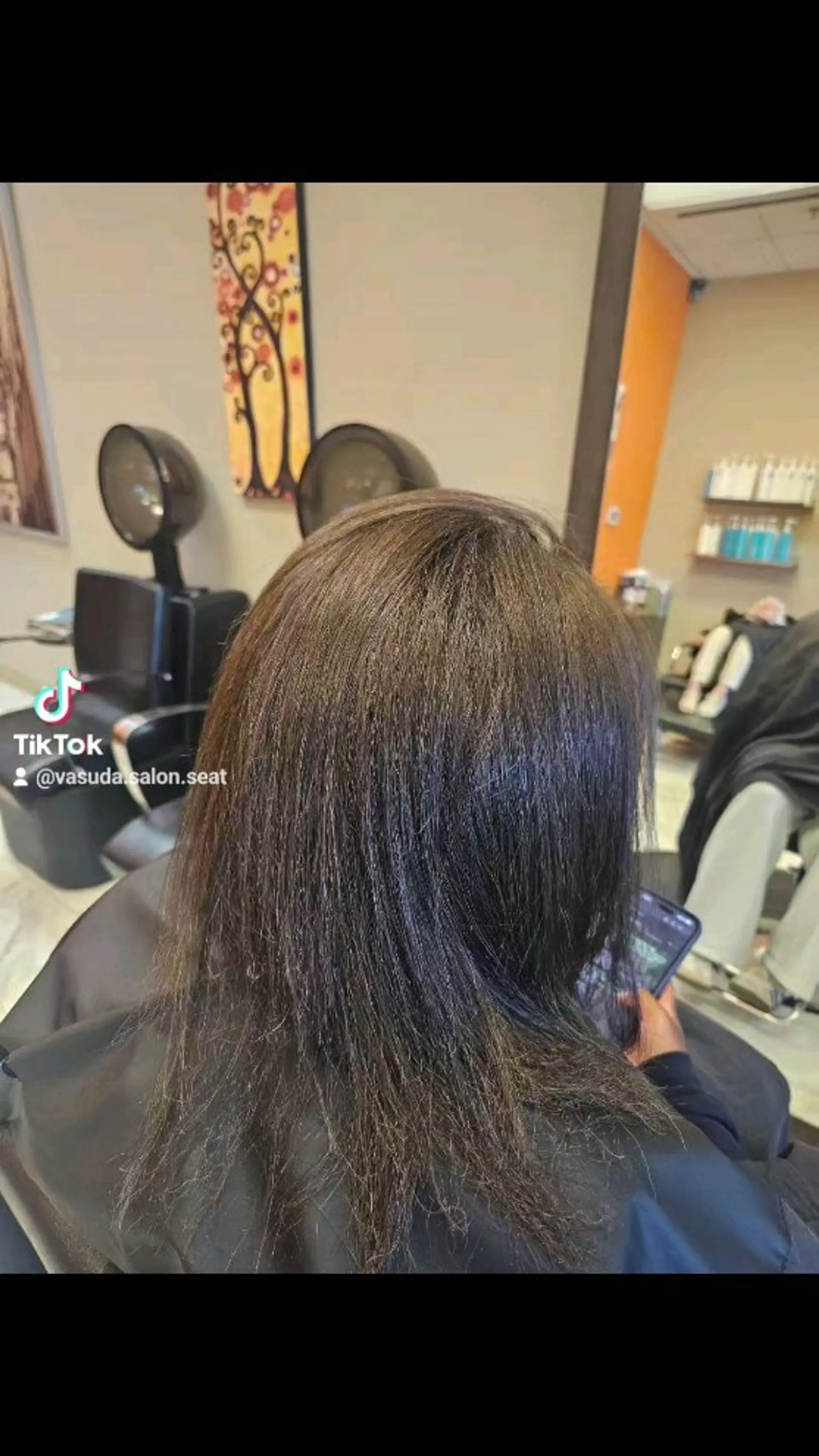 Straight shoulder-length dark brown hair with soft, subtle balayage highlights. 1