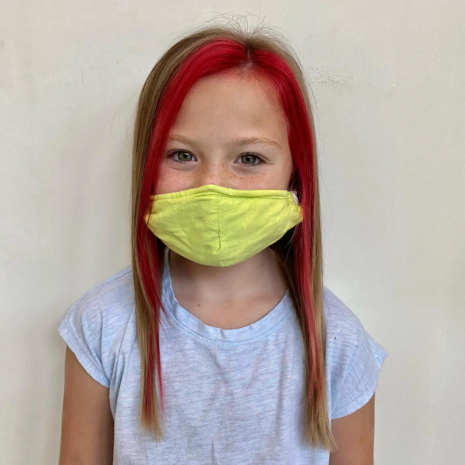 Straight light brown hair accented with vibrant crimson red face-framing sections. 1