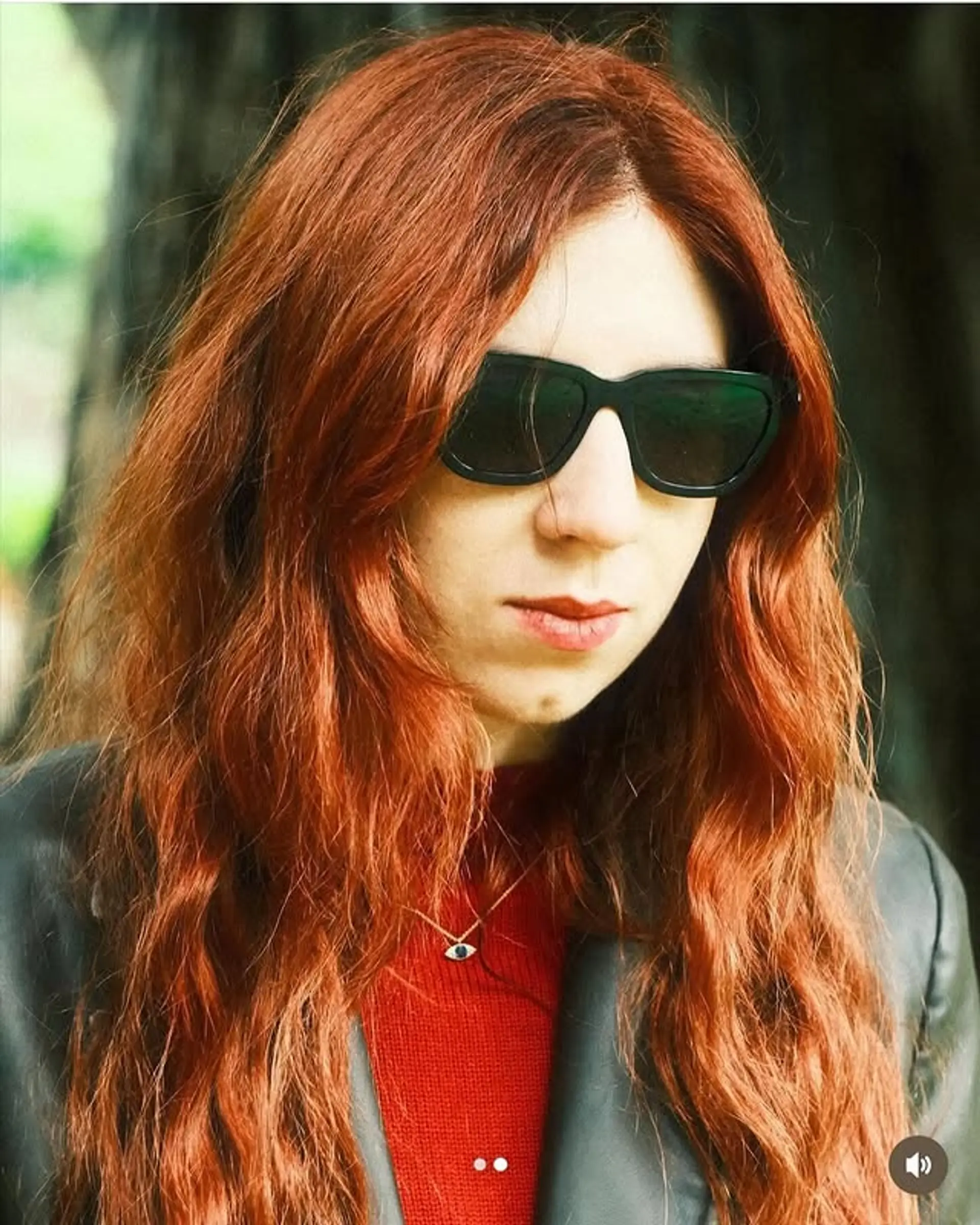 Long, wavy hair with soft layers and vibrant color. 1