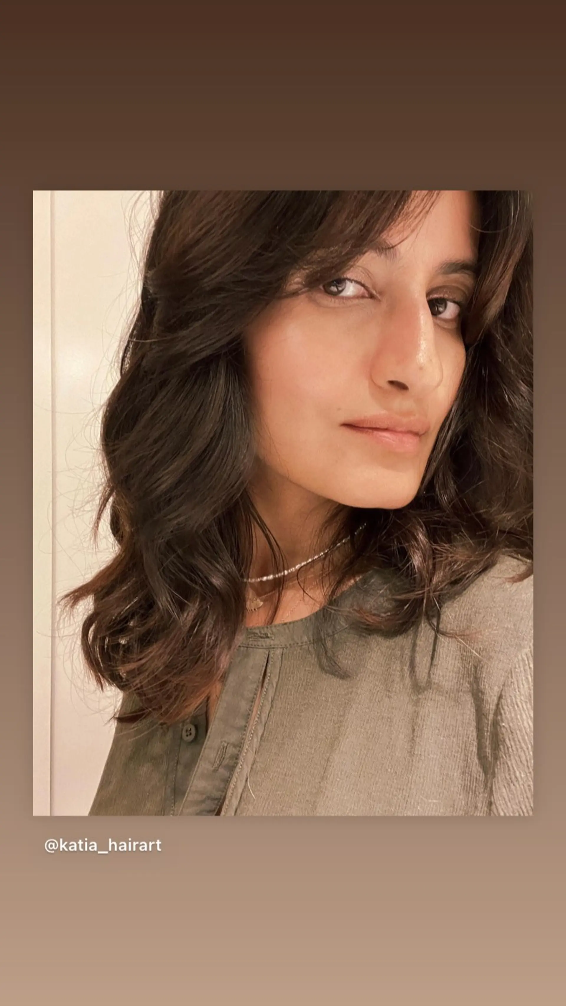 A medium-length shag with face-framing layers and curtain bangs. 1