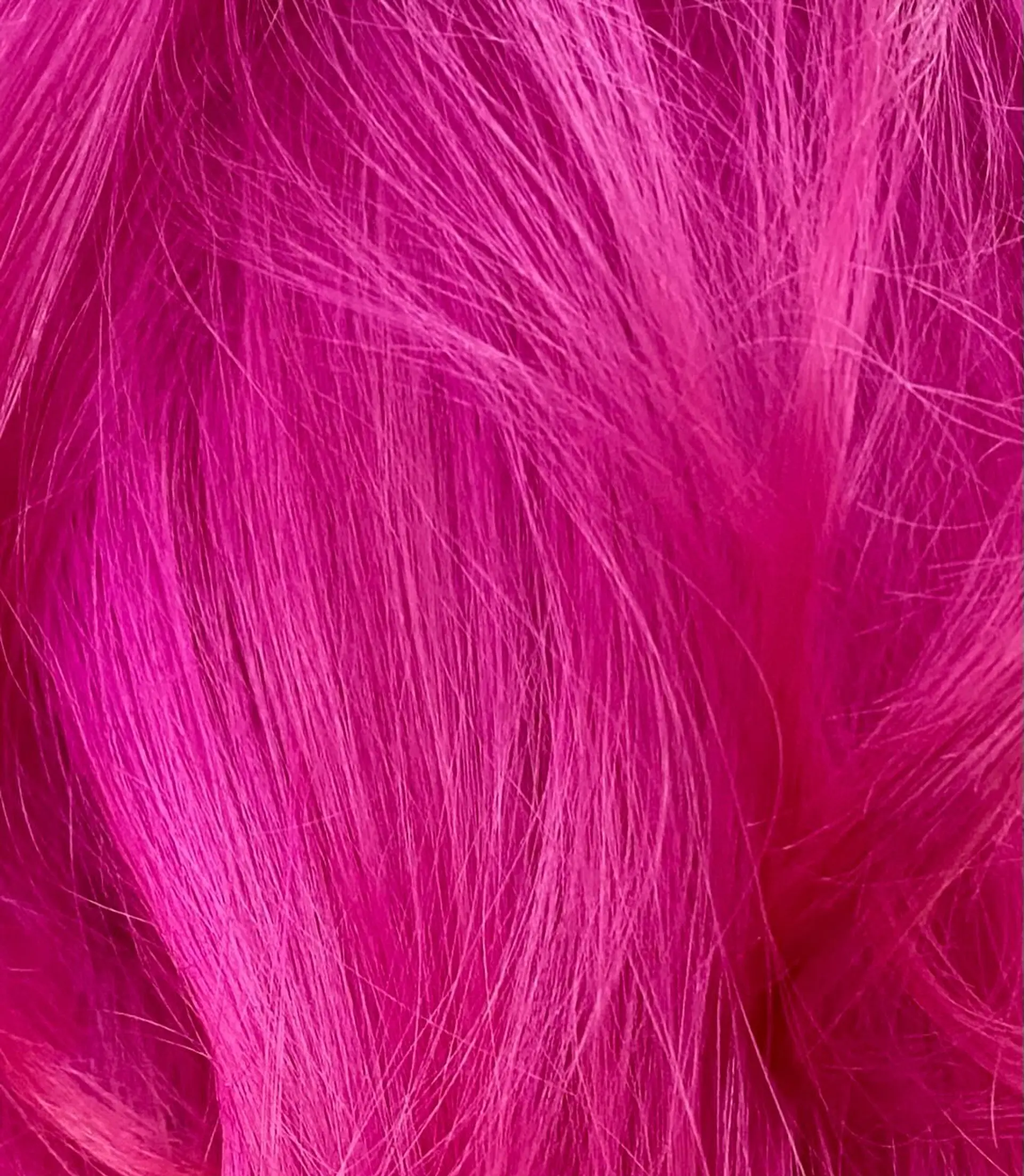 A short, layered bob with blunt bangs. 3