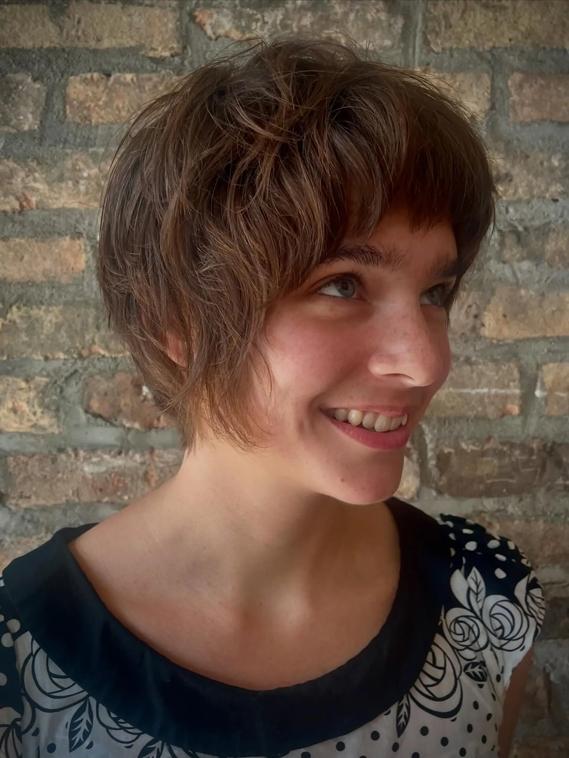 A shaggy pixie bob with choppy layers and full bangs. 3