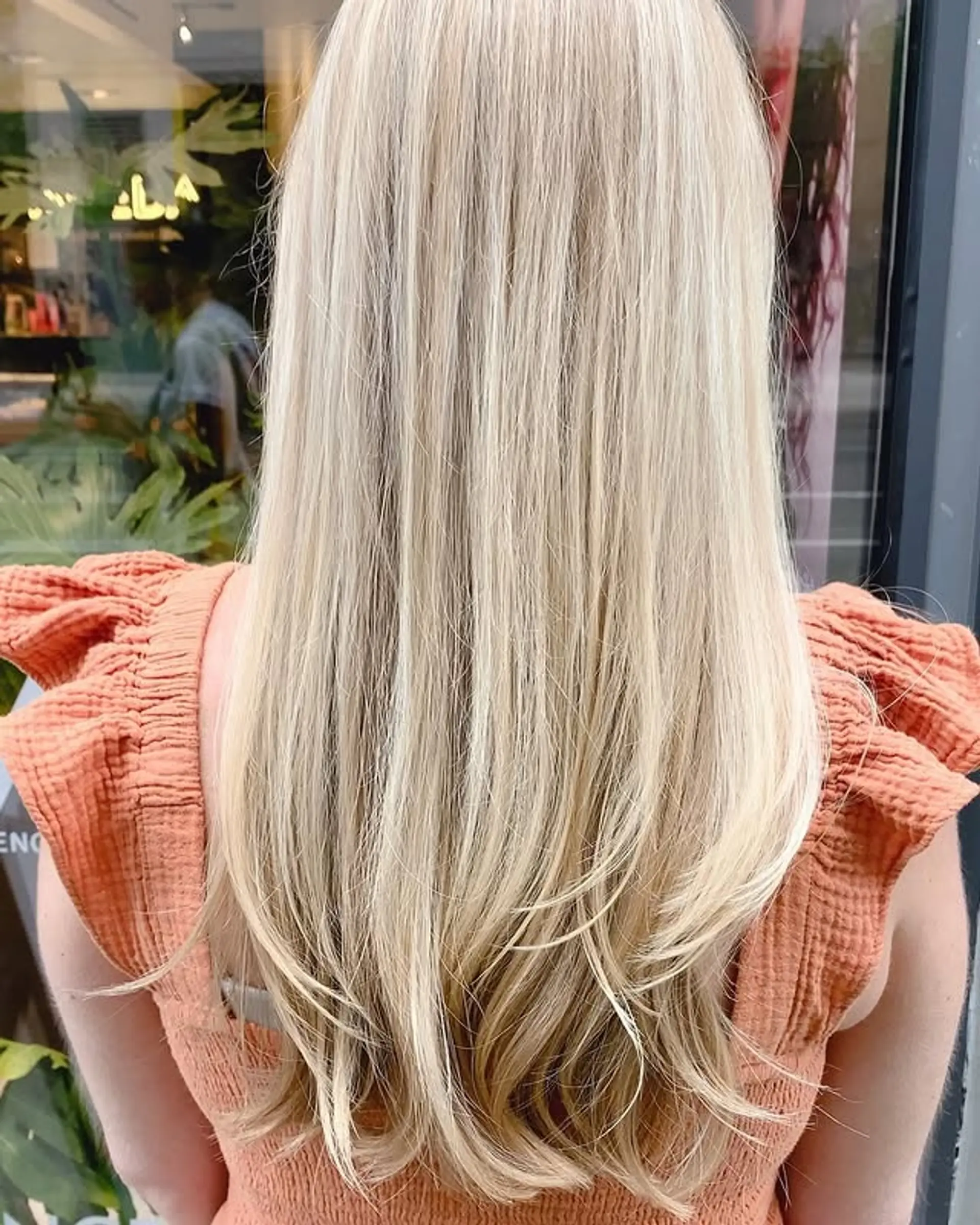 A long, layered haircut with face-framing layers. 1