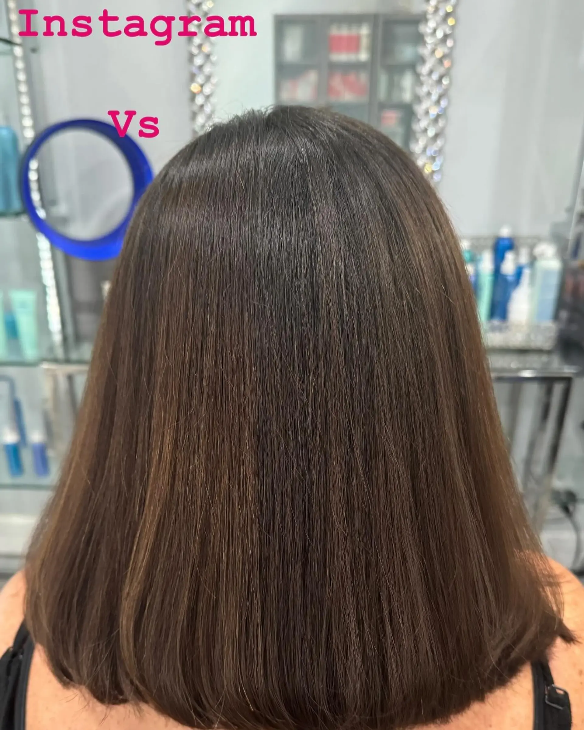 A sleek, shoulder-length blunt cut styled pin-straight with a glossy, polished finish. 1