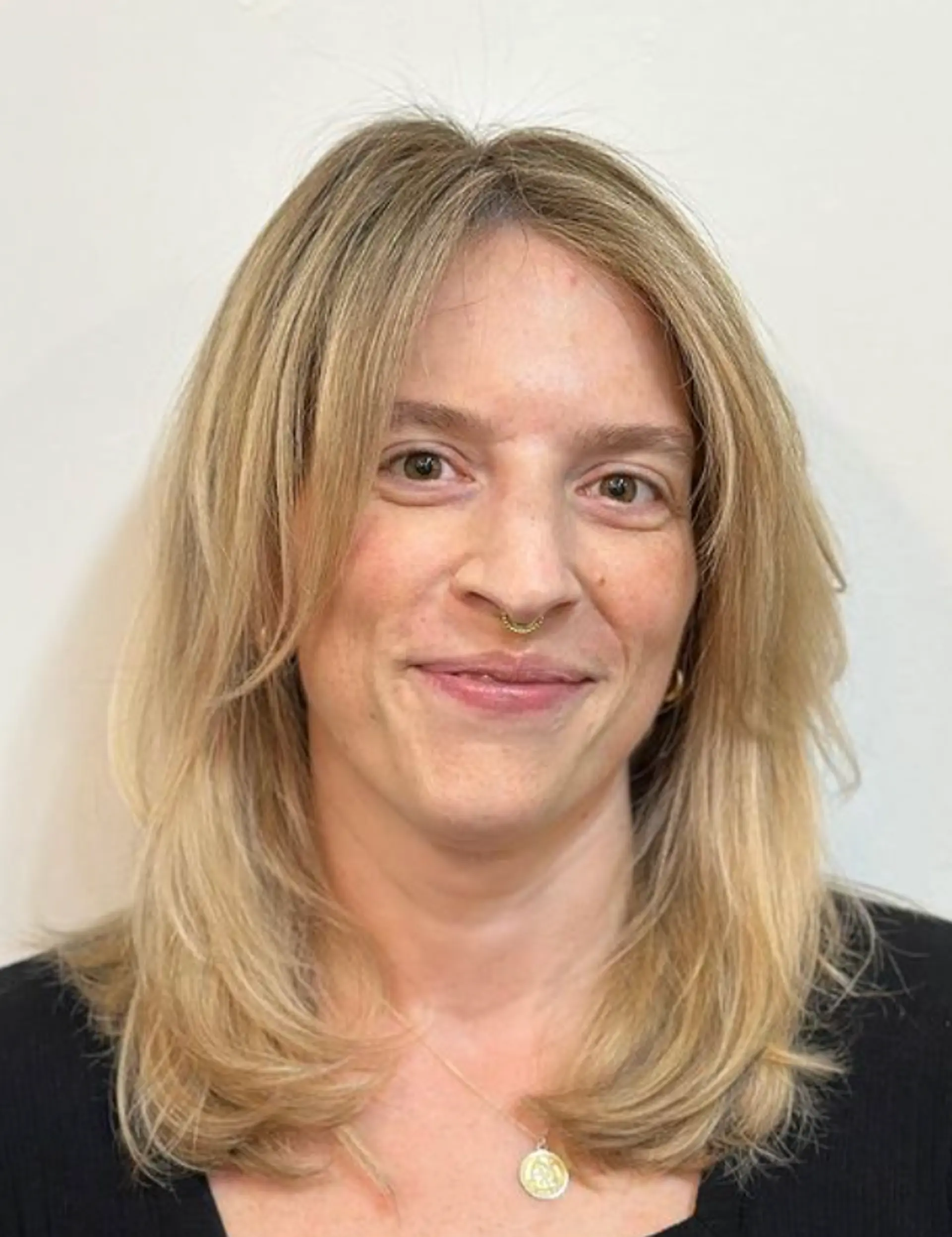 Medium-length, straight, layered hair with feathered ends, face-framing strands, and a subtle side part. The blonde color is interspersed with light brown hues, giving the hair a natural shine.

Color by @simabeautynyc
 1