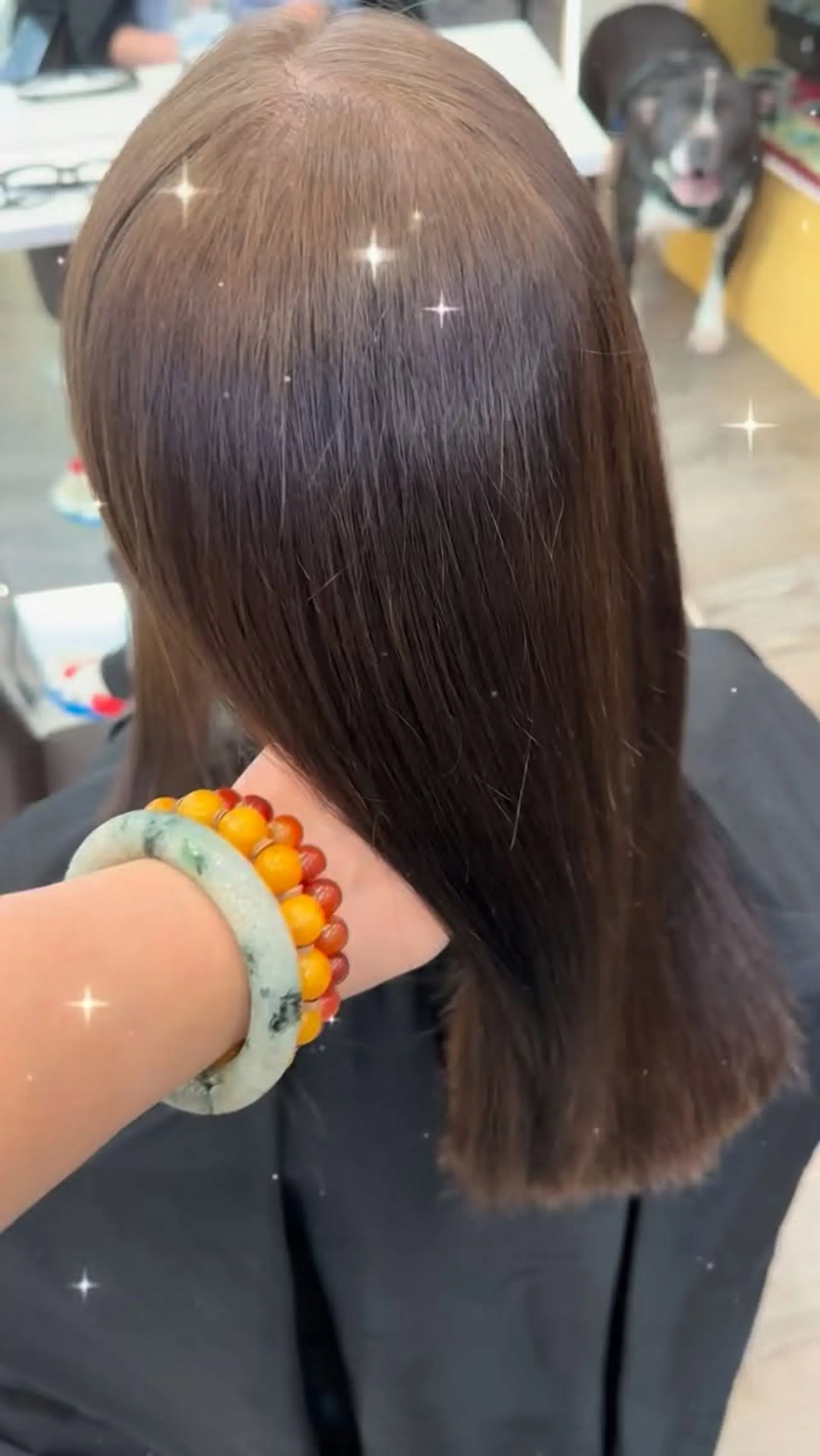Silky, pin-straight medium-length hair with a high-shine, glossy finish. 1