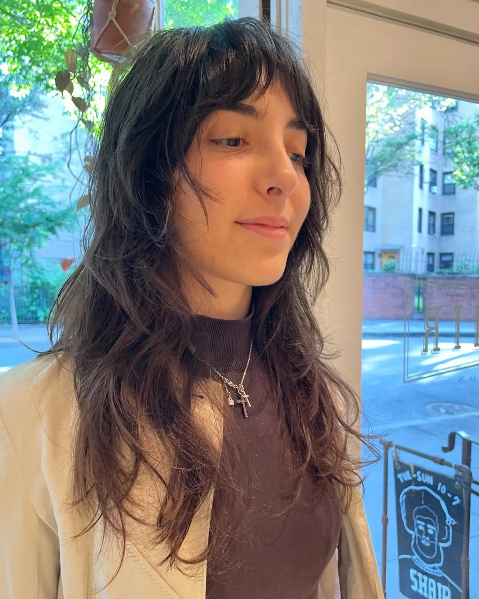 A modern shag with choppy layers and trendy curtain bangs. 2