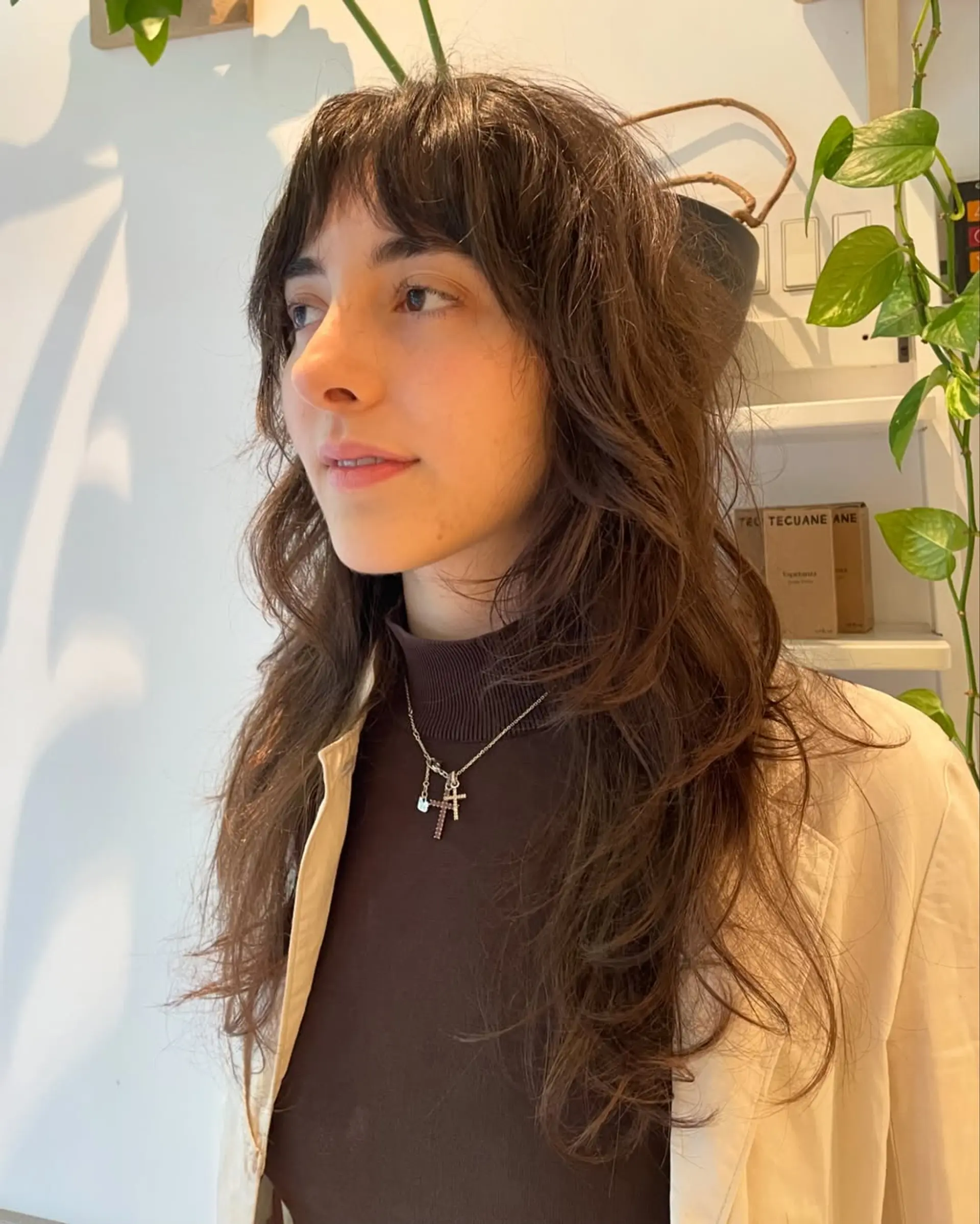 A modern shag with choppy layers and trendy curtain bangs. 4
