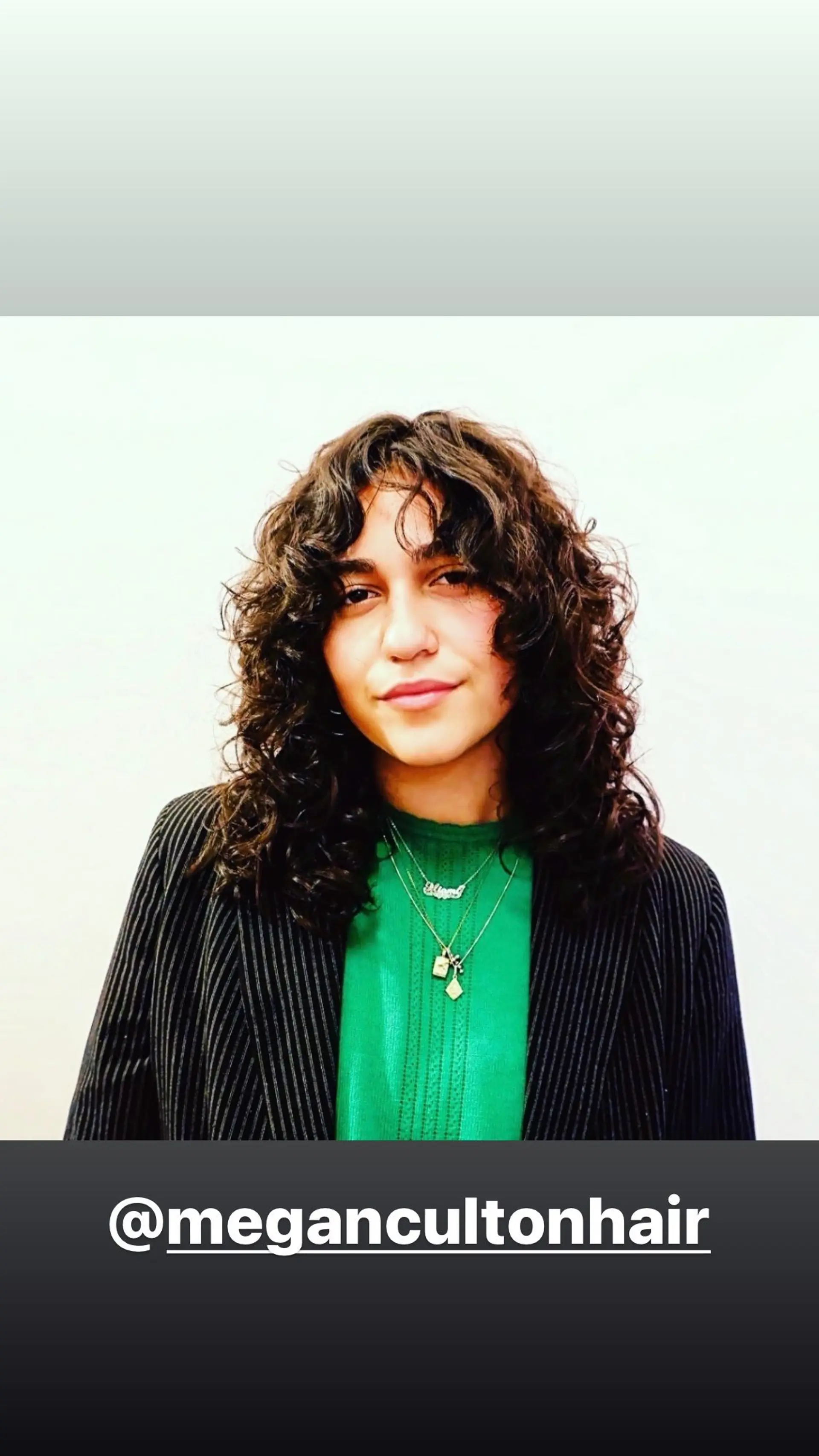 A shaggy curly lob with fringe bangs. 1