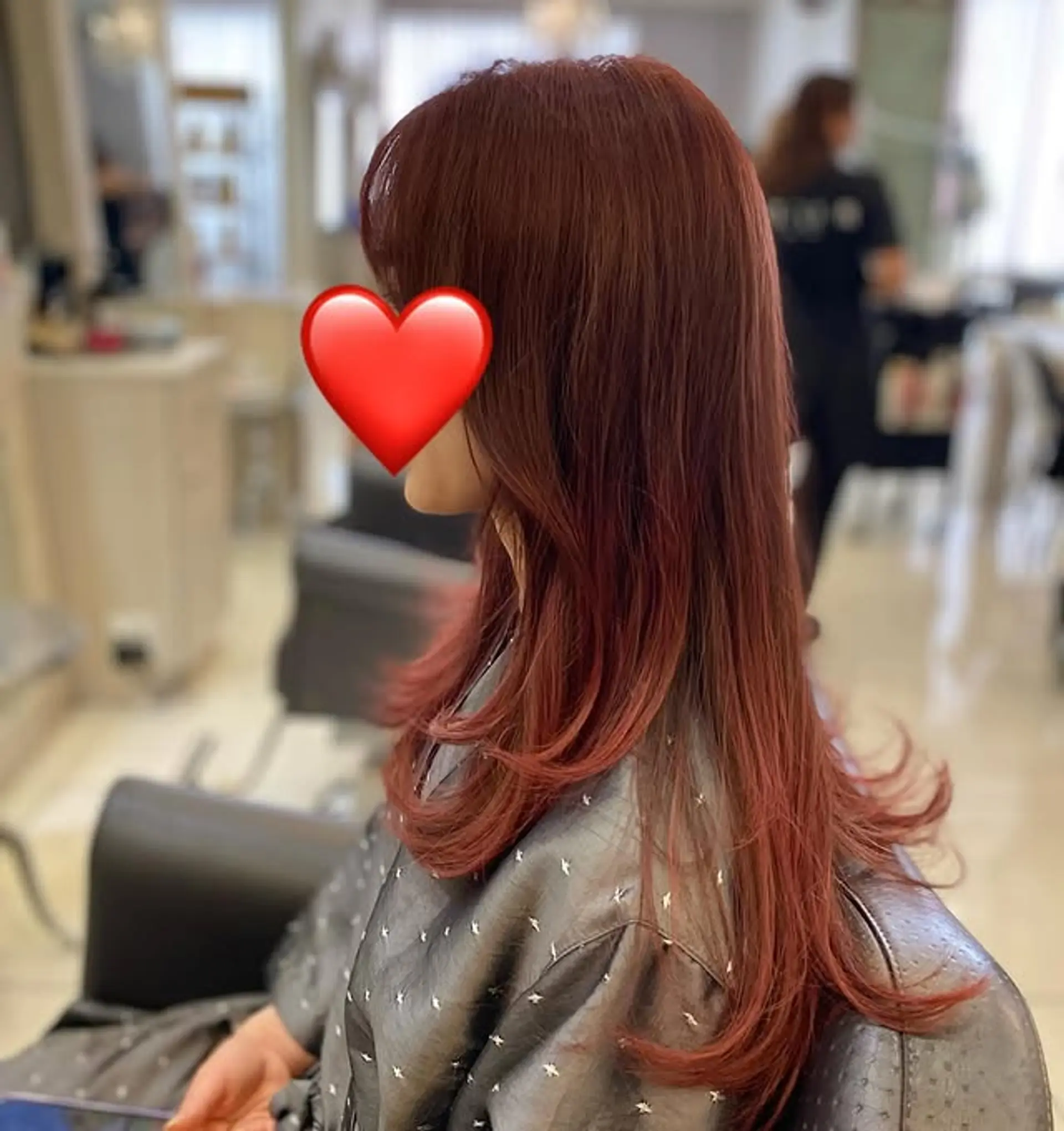 Long layered hairstyle with face-framing layers and bangs. 1