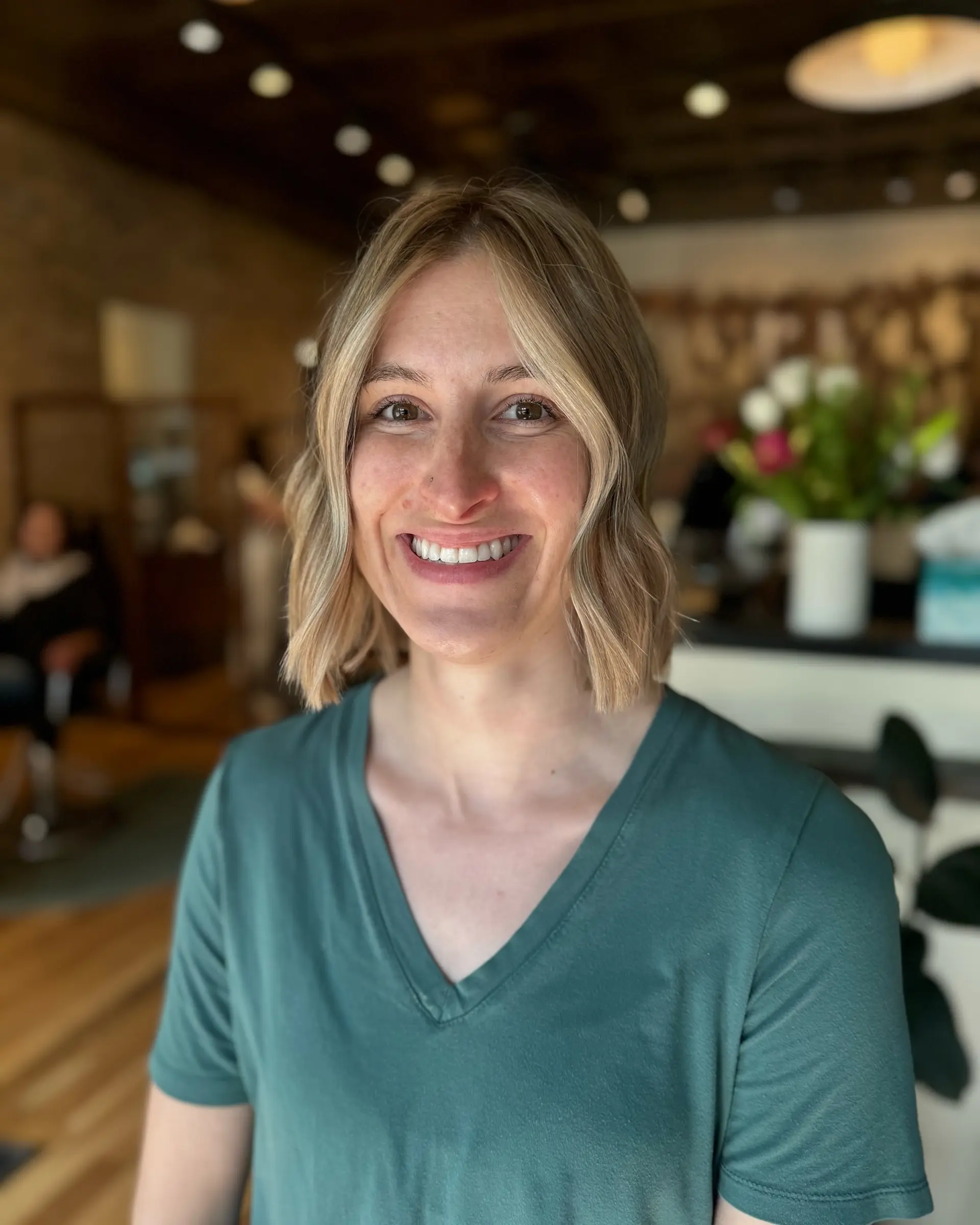 A trendy wavy lob with soft beachy waves and face-framing layers. 1