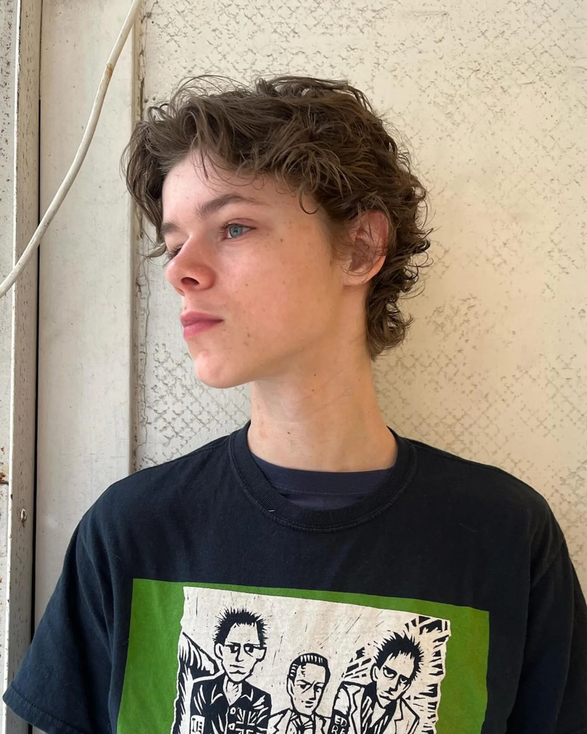 A model with a light pink short shag haircut, a key NYC hair trend for 2025. - Preview 1