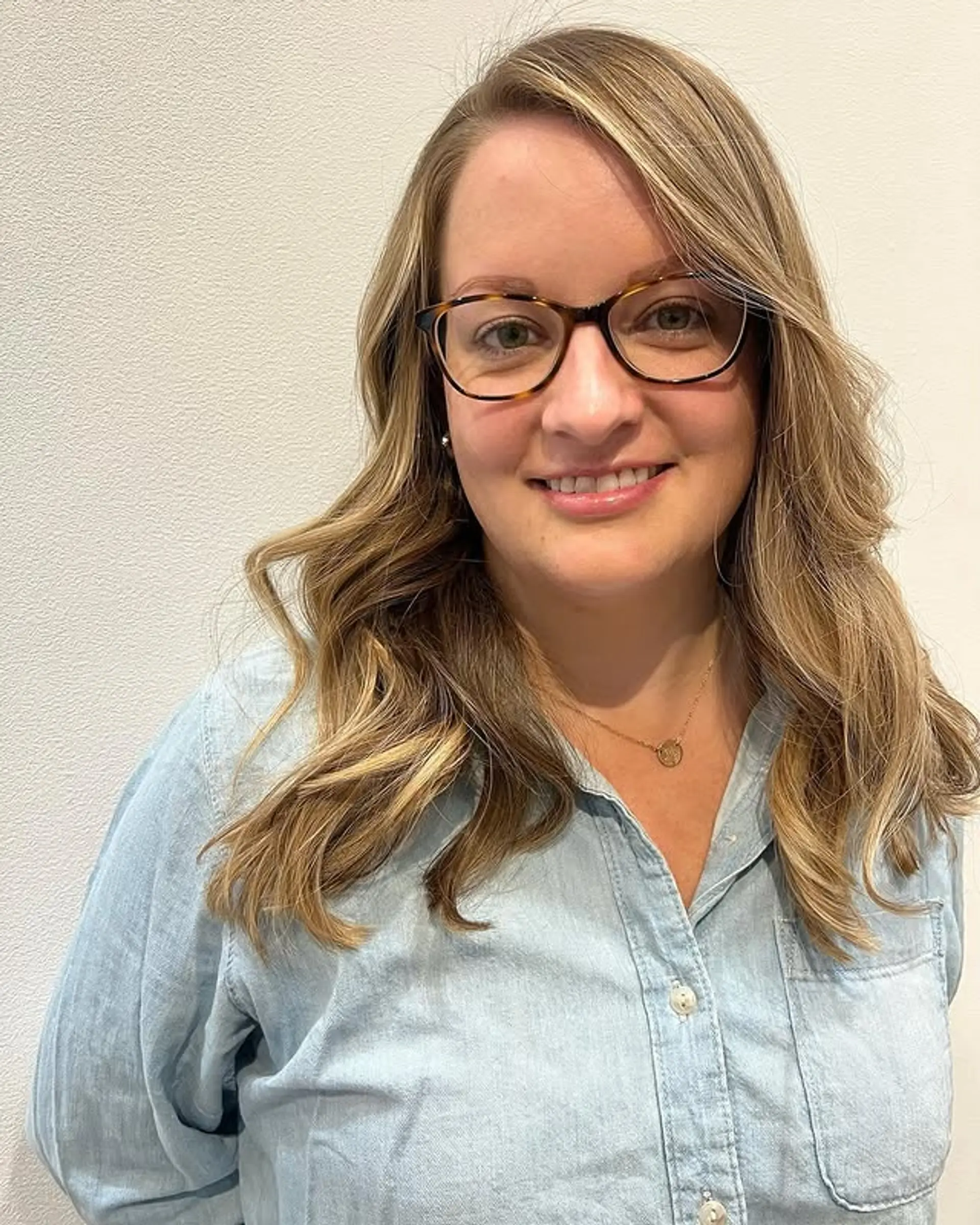 Long, layered wavy hair with blonde highlights. 1