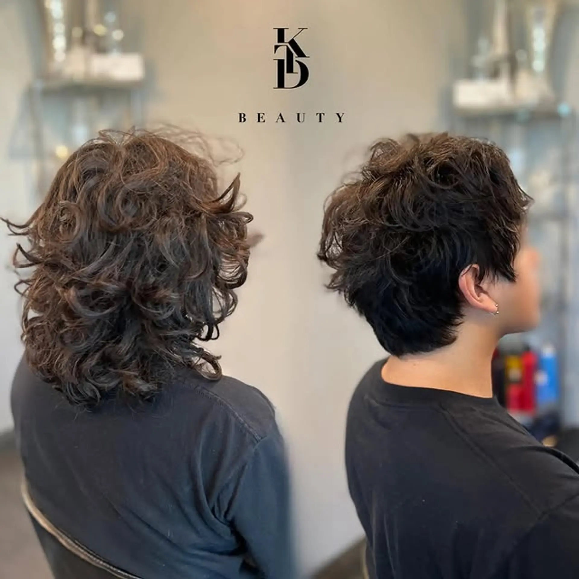 This textured curly hairstyle features a layered cut to enhance natural curls. 1