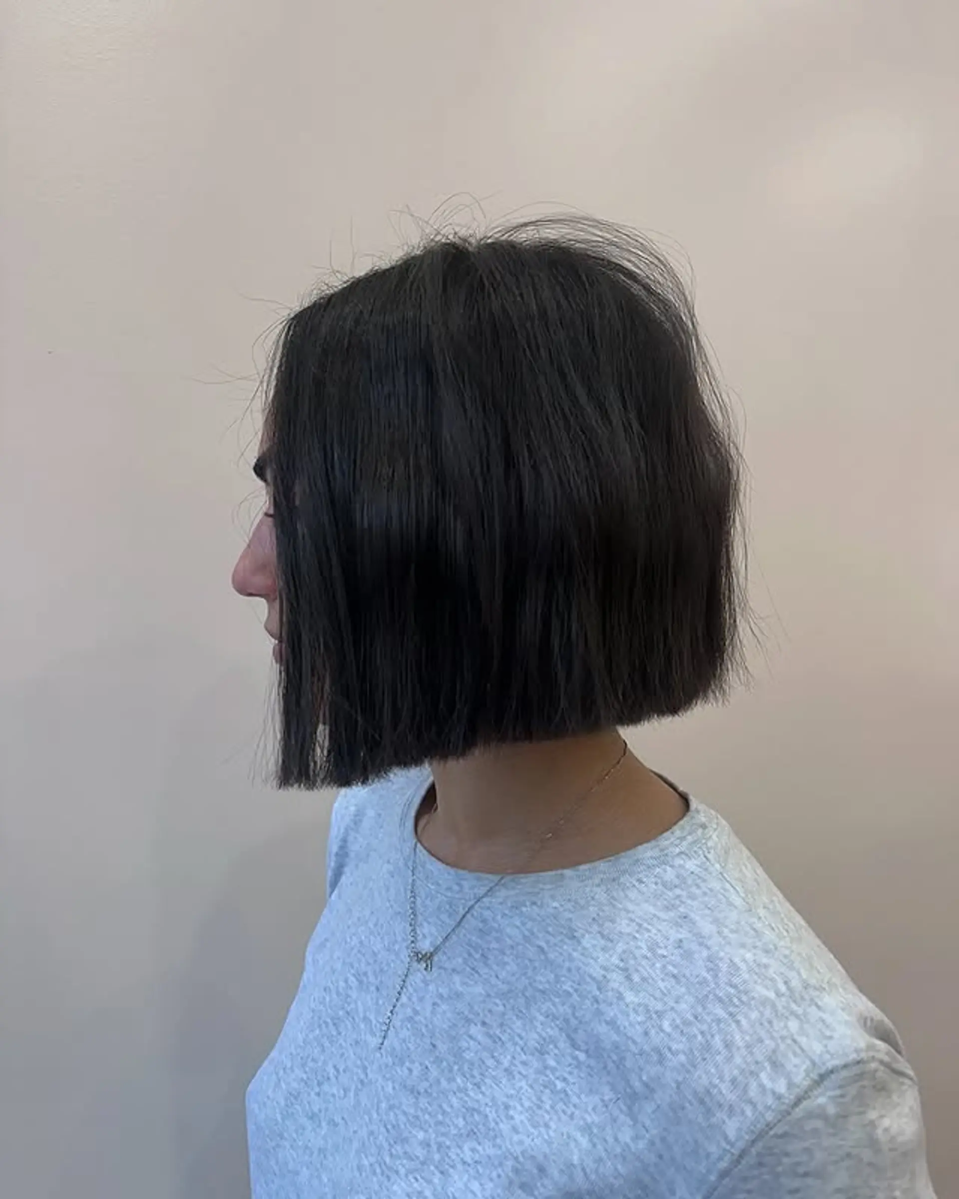 A blunt, chin-length bob with a sleek finish. 1