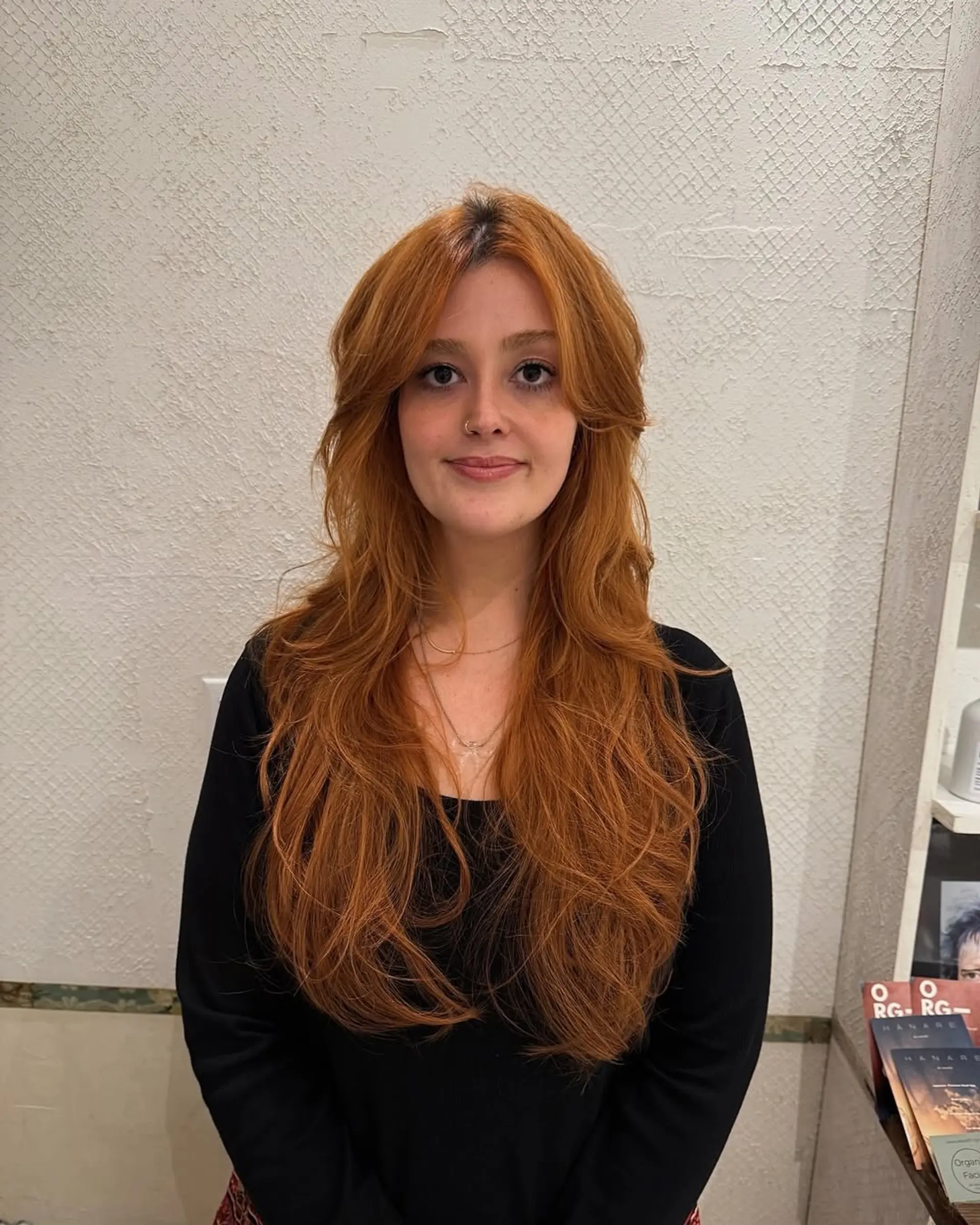Voluminous very long wavy hair in a vibrant copper-red color with natural waves cascading down the back. 2