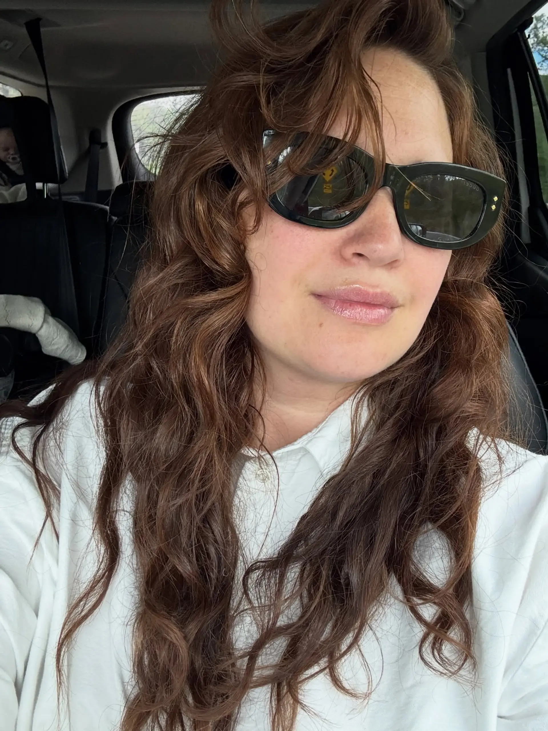 Long, layered brown hair featuring soft, natural waves, volume, and face-framing bangs. 1