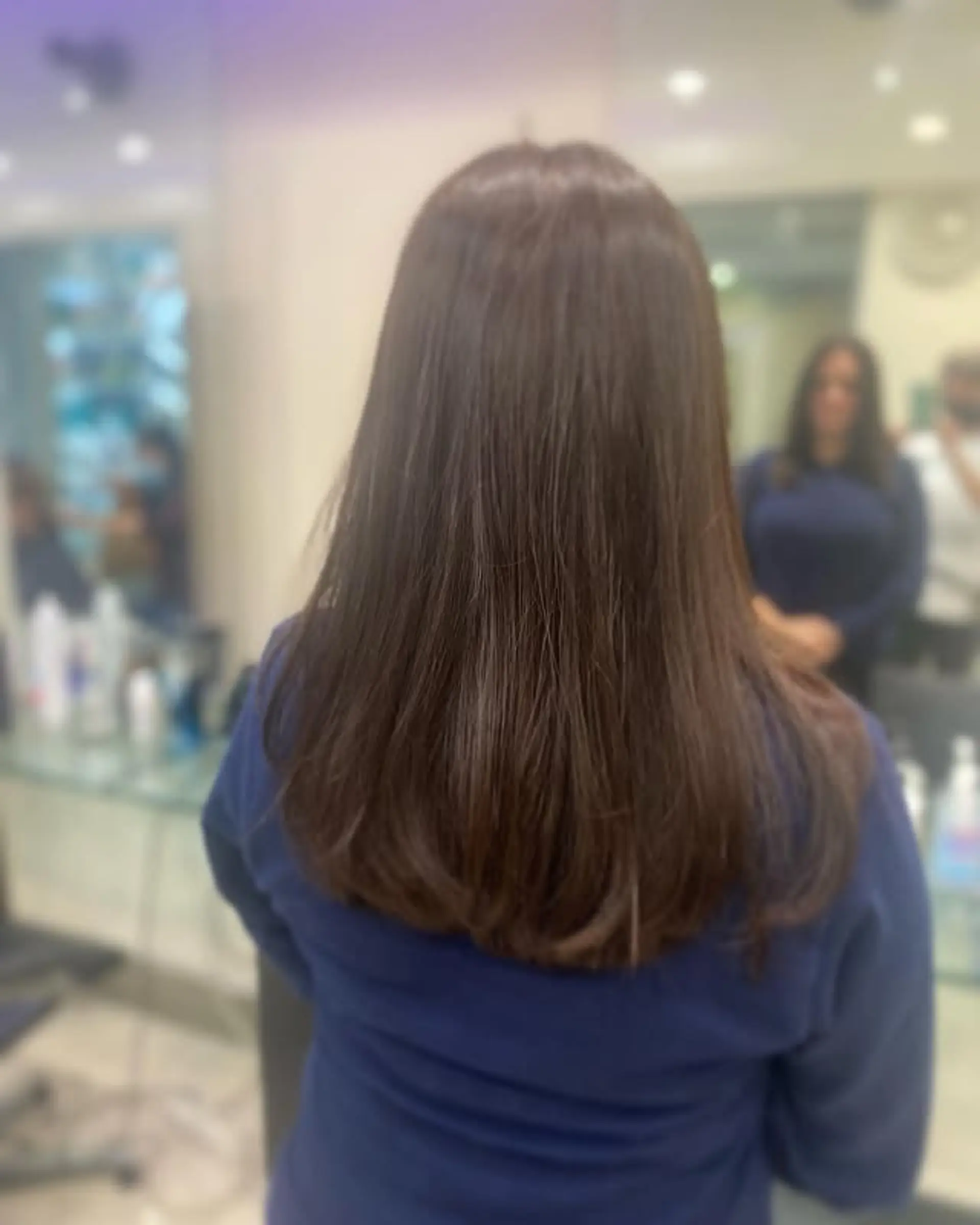 A sleek, straight, medium-length hairstyle with a U-cut. 1