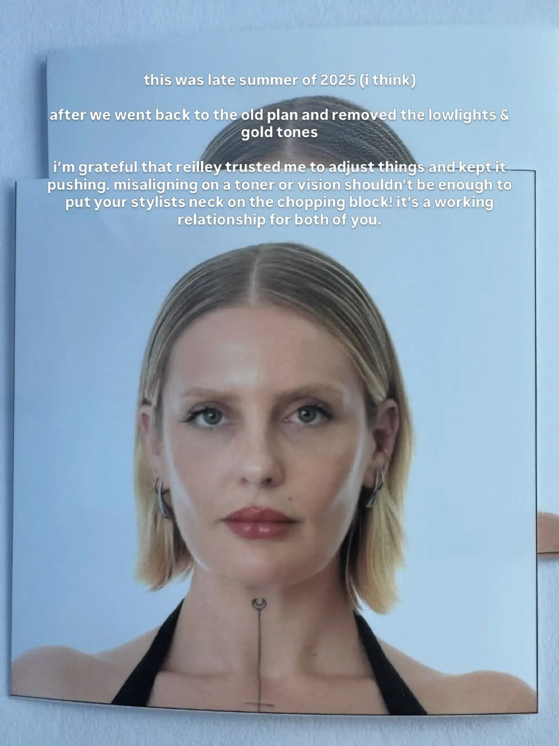 A sleek, chin-length straight blonde bob styled with a crisp center part and tucked neatly behind the ears. 1