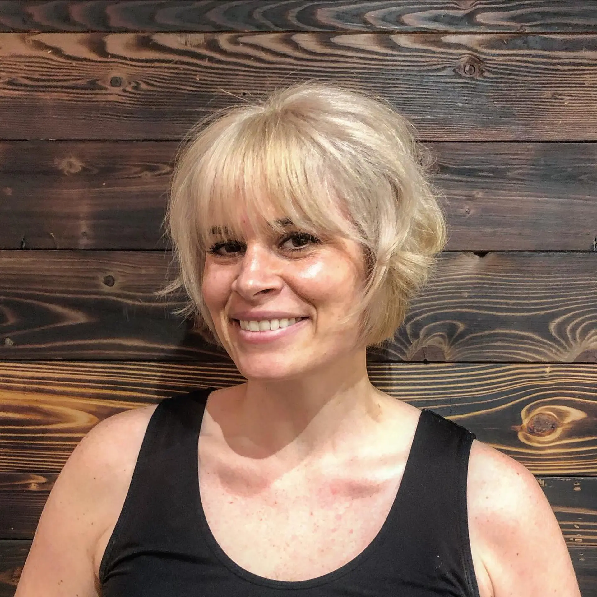 A short, textured bob with choppy layers for added volume and a tousled look. 2