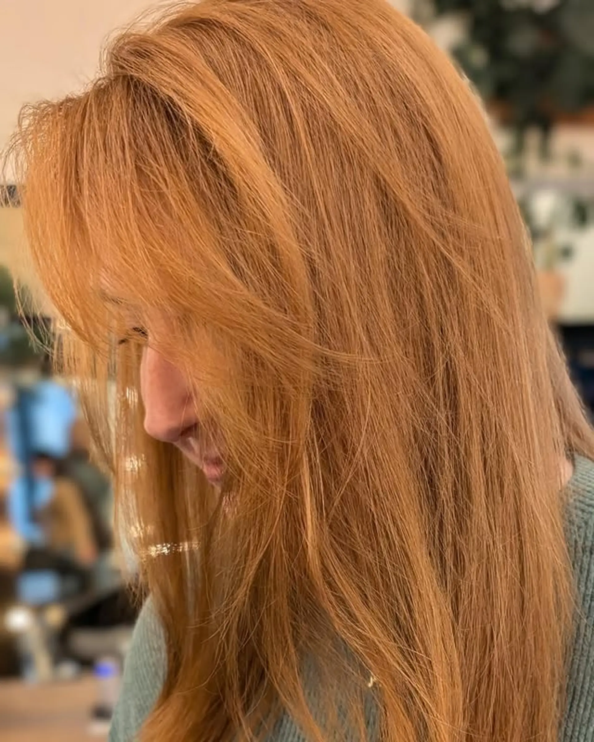 Long layered haircut with face-framing layers and bangs. 1