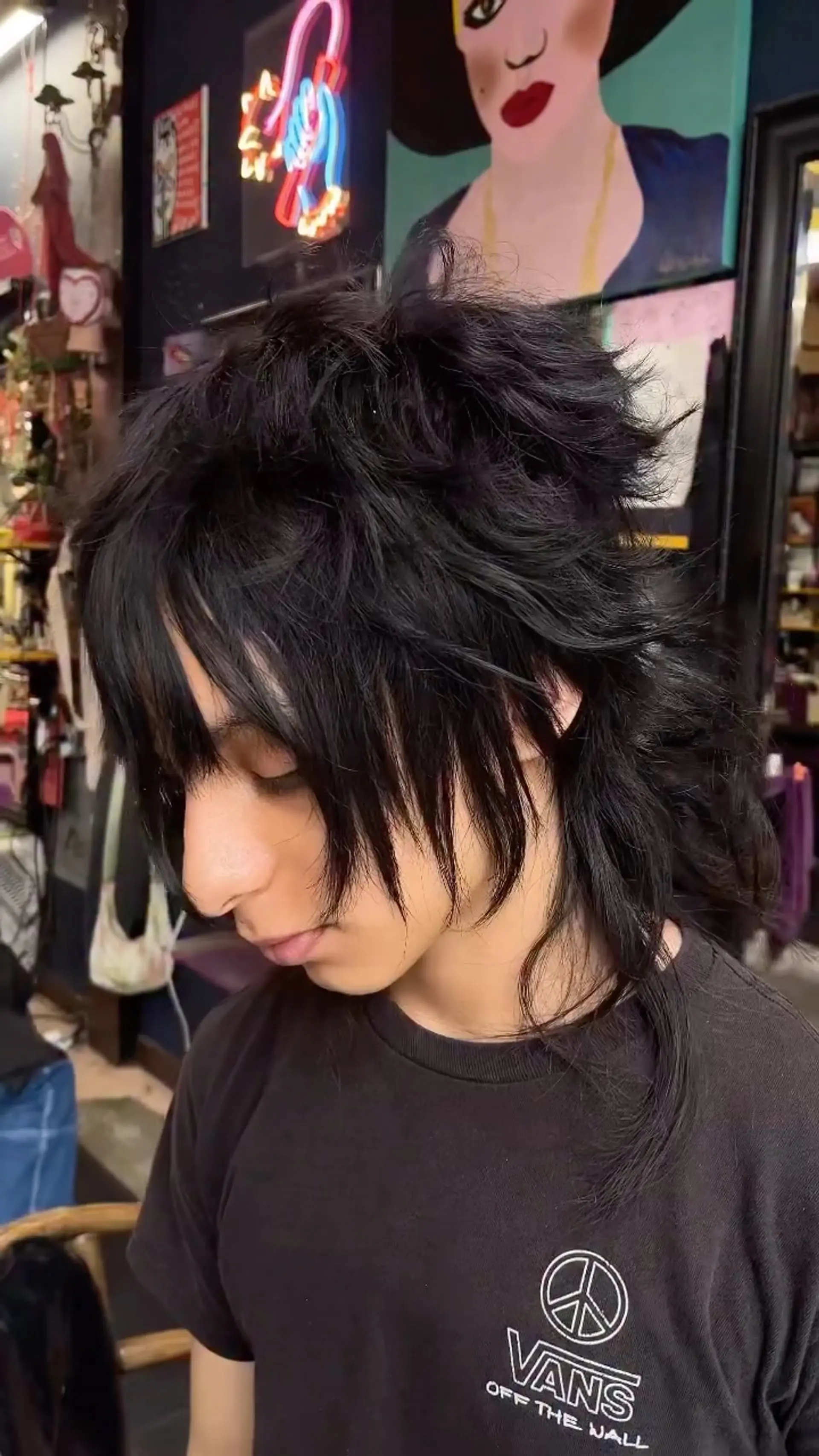 A heavily textured, choppy visual kei shag mullet with wispy face-framing fringe and voluminous, layered crown lengths flowing into a longer tail. 1