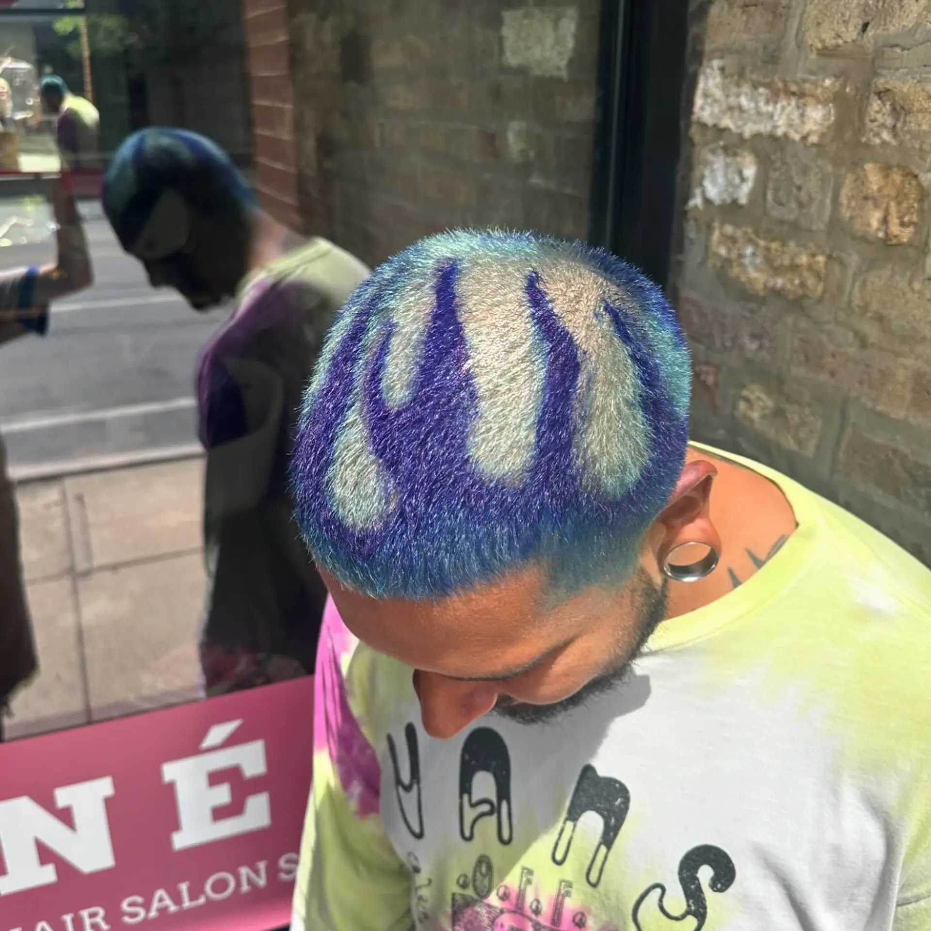 A very short buzzcut with a unique floral design. 5