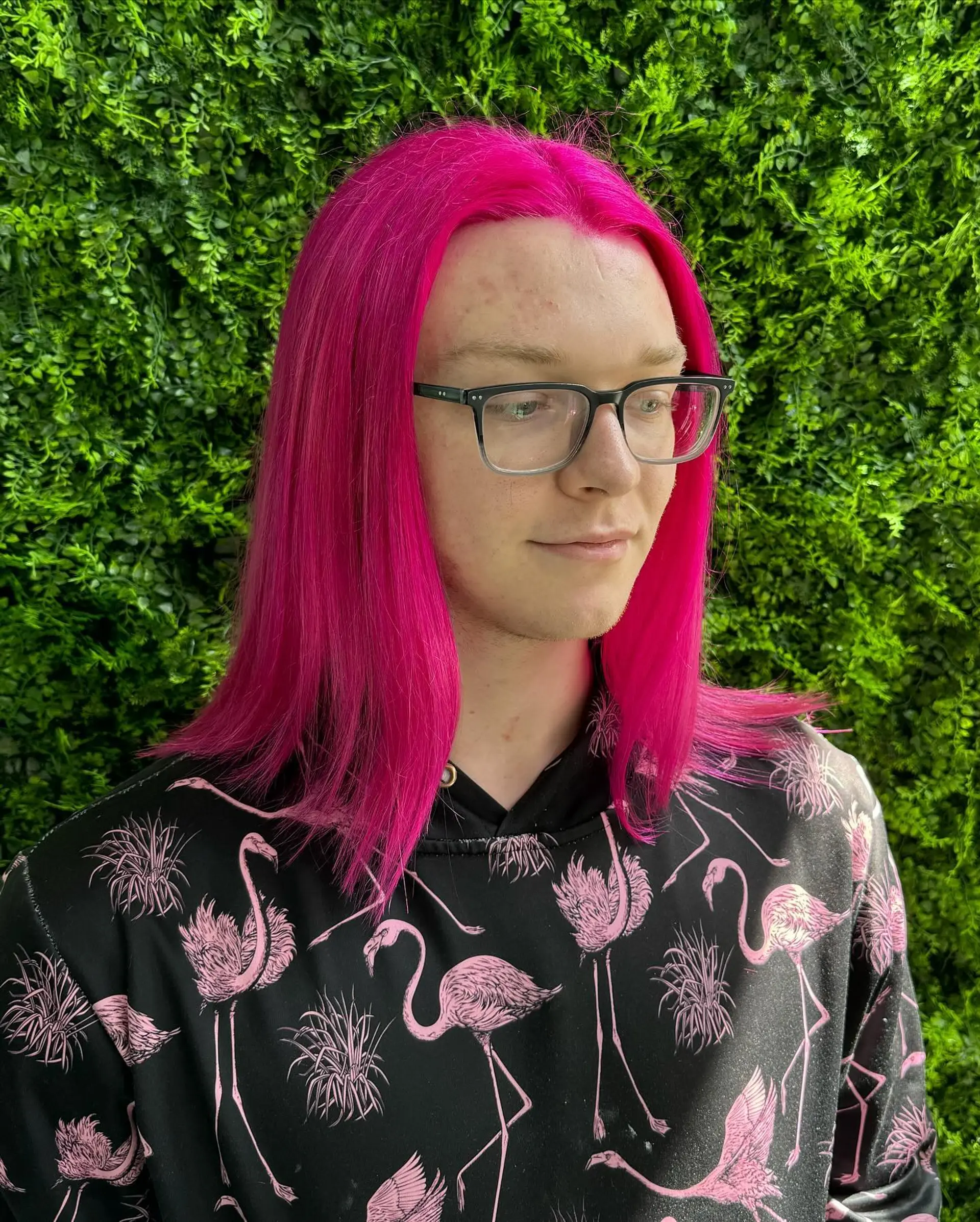 Long, straight hair dyed a vibrant hot pink. 2