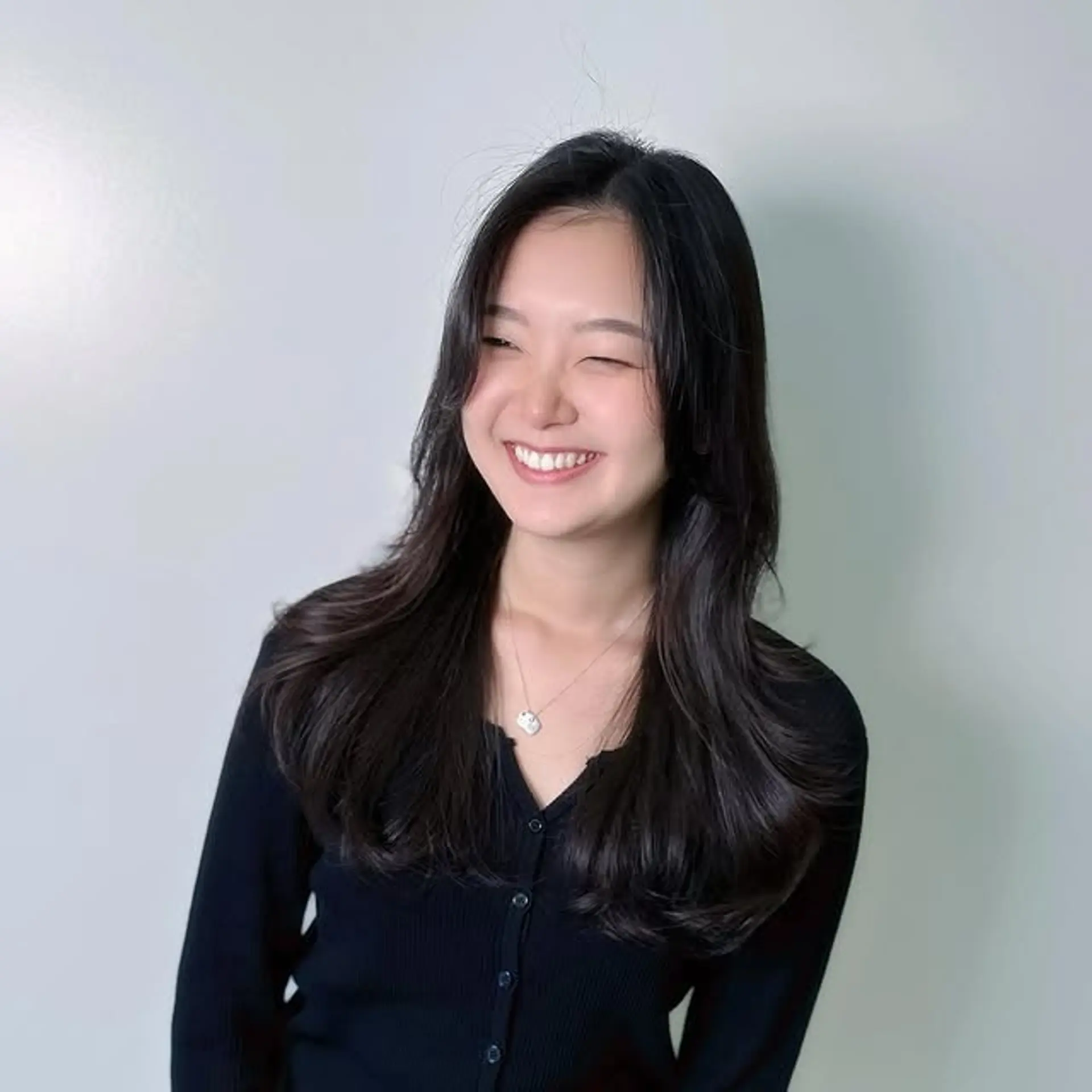 Long layered hair with soft, flowy waves and face-framing layers. 1