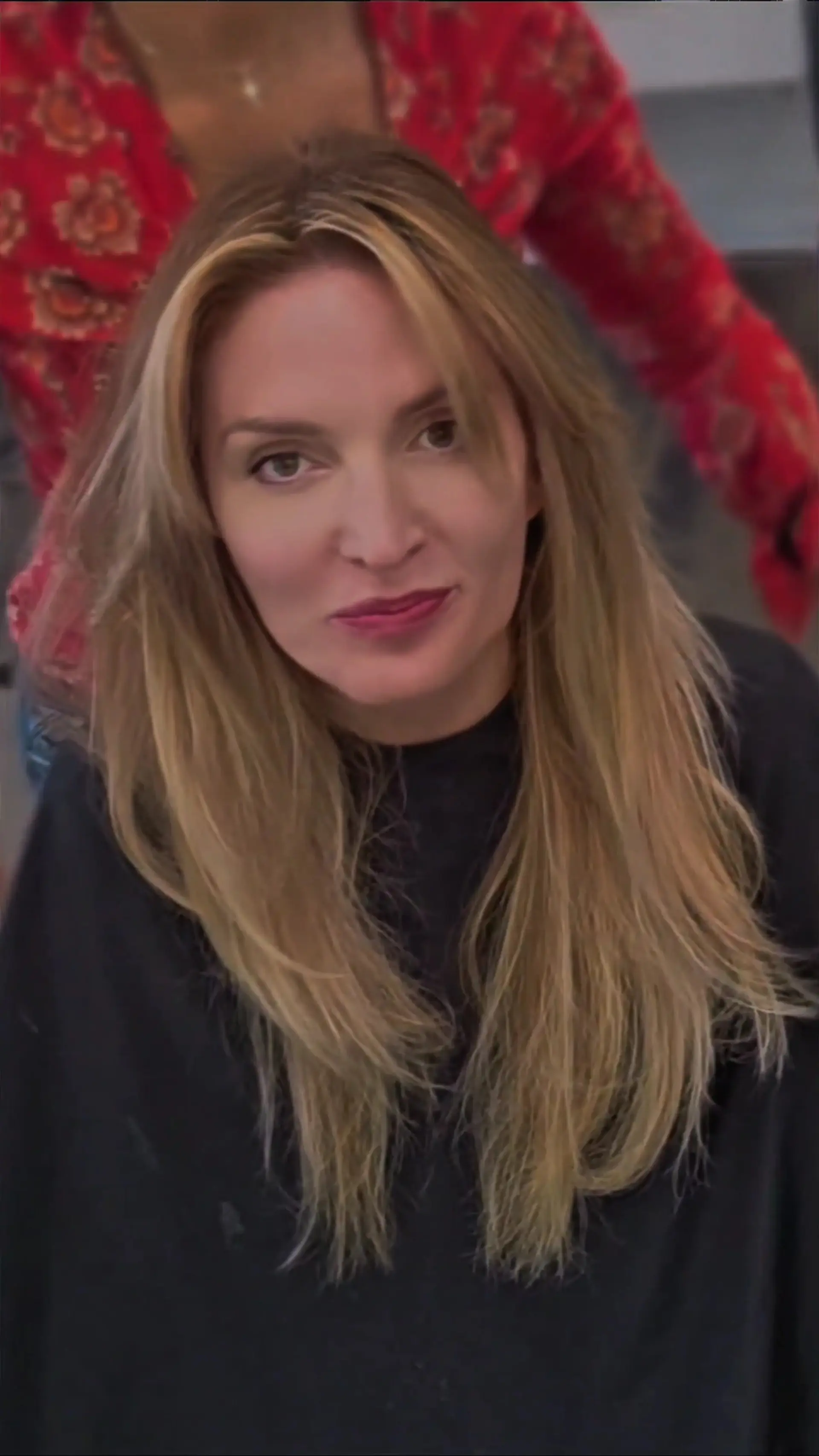 Long, layered hair featuring bright blonde face-framing highlights and soft curtain framing. 1