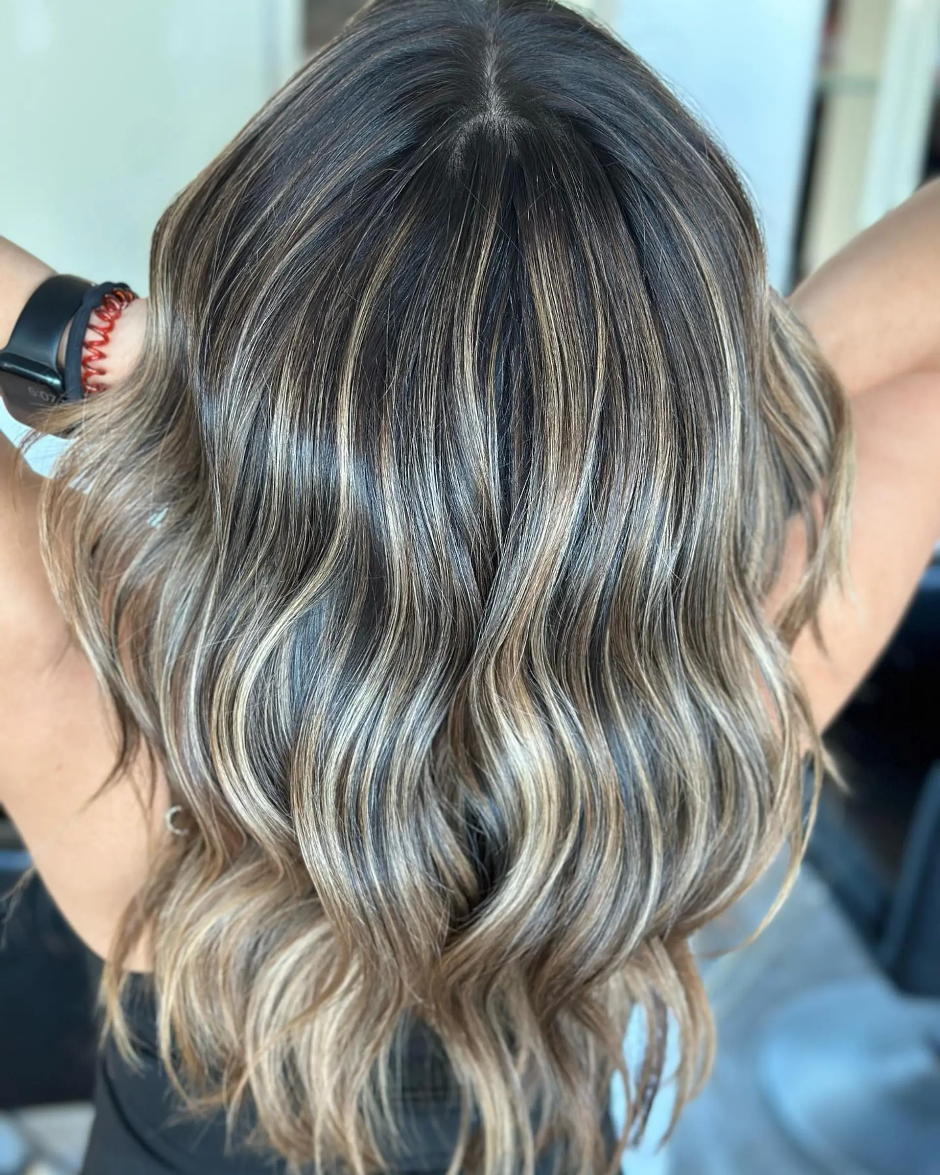 Long, wavy hair with ash blonde balayage highlights. 1