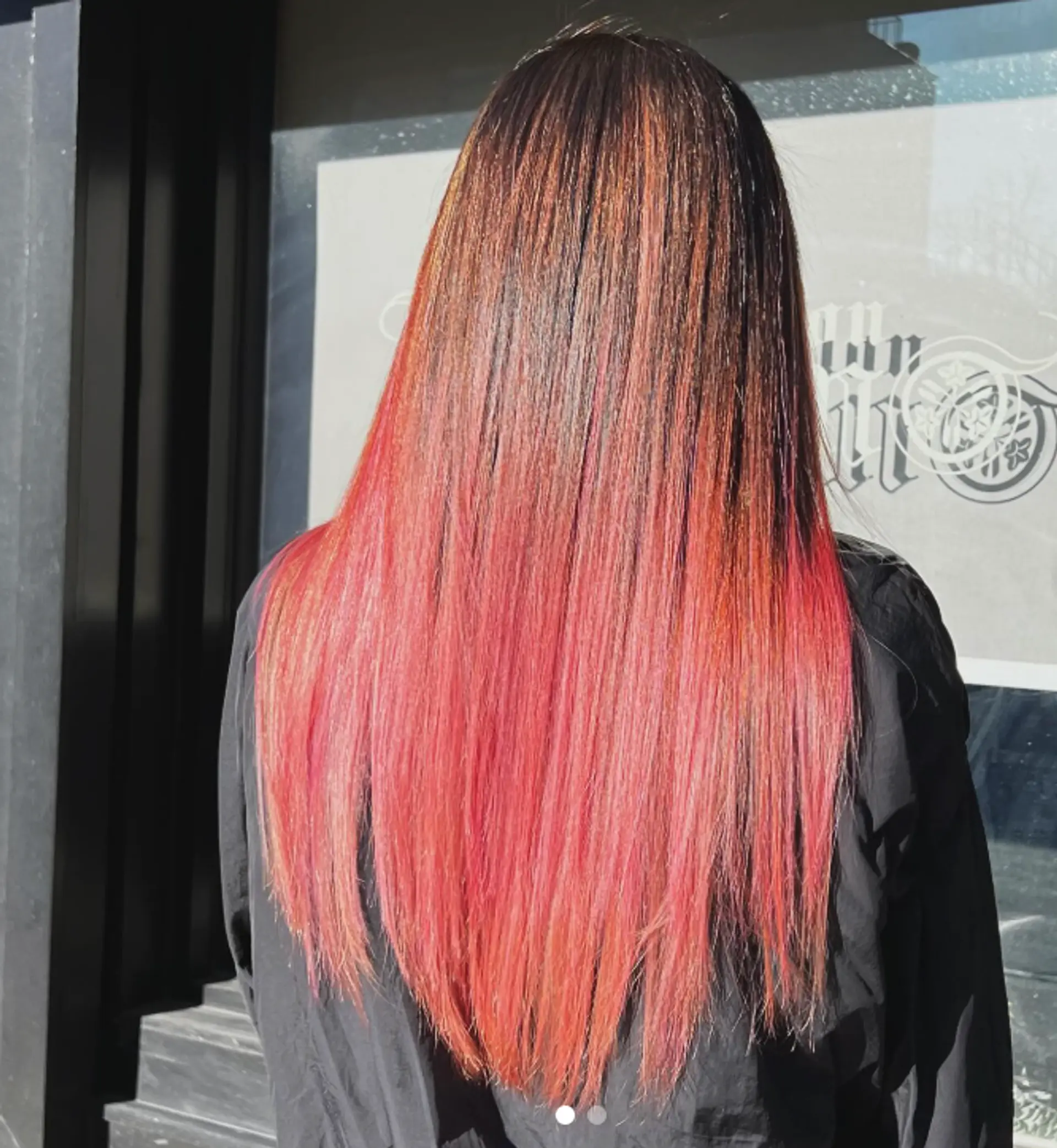 Long, straight hair with a rose gold ombre effect. 1