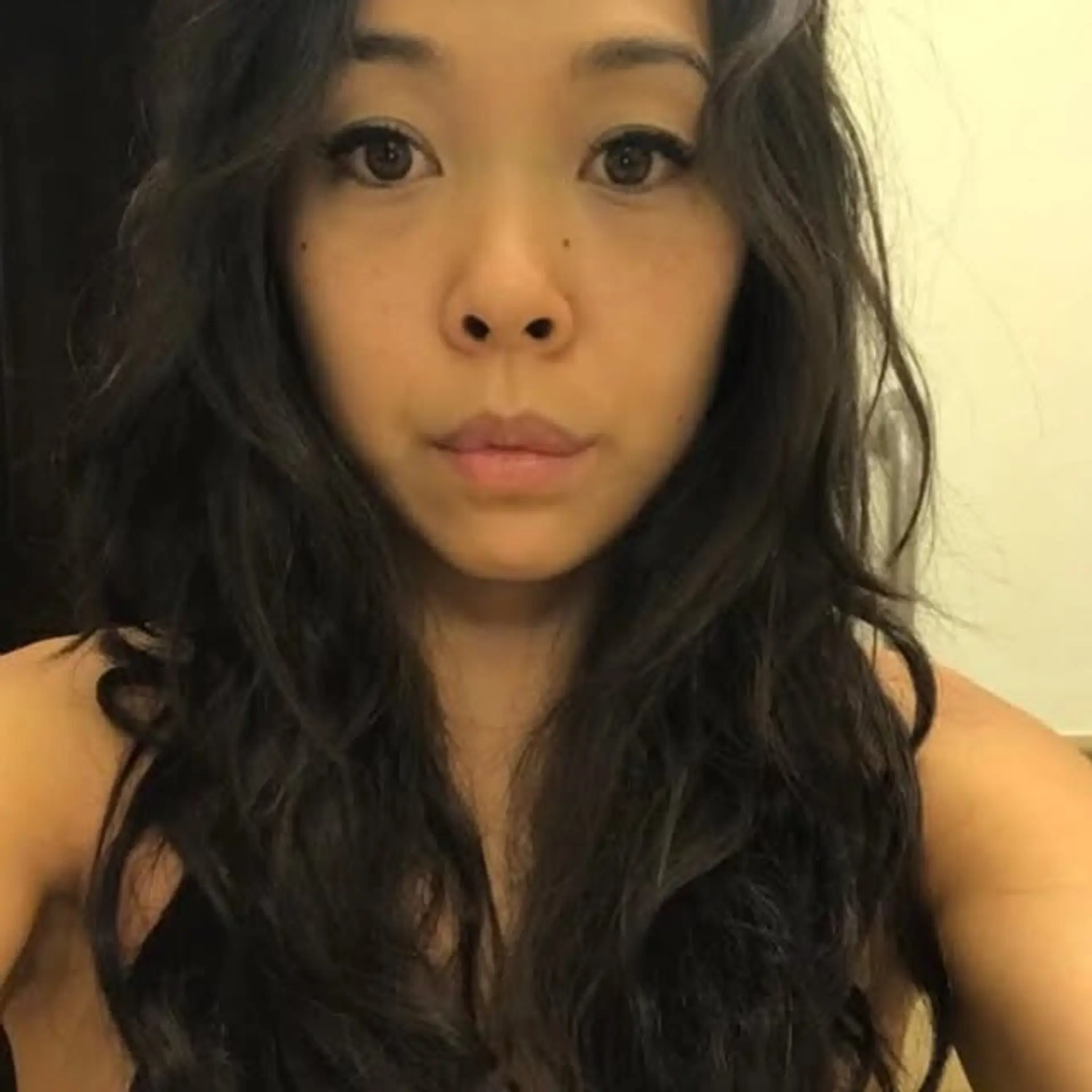 Long, soft wavy hair with a natural, effortless style. 1