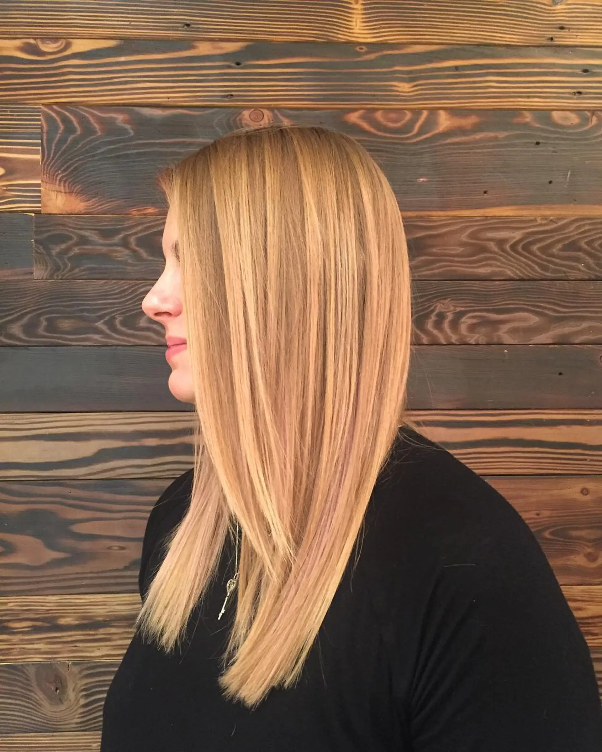 Long layered hairstyle with subtle balayage highlights. 1